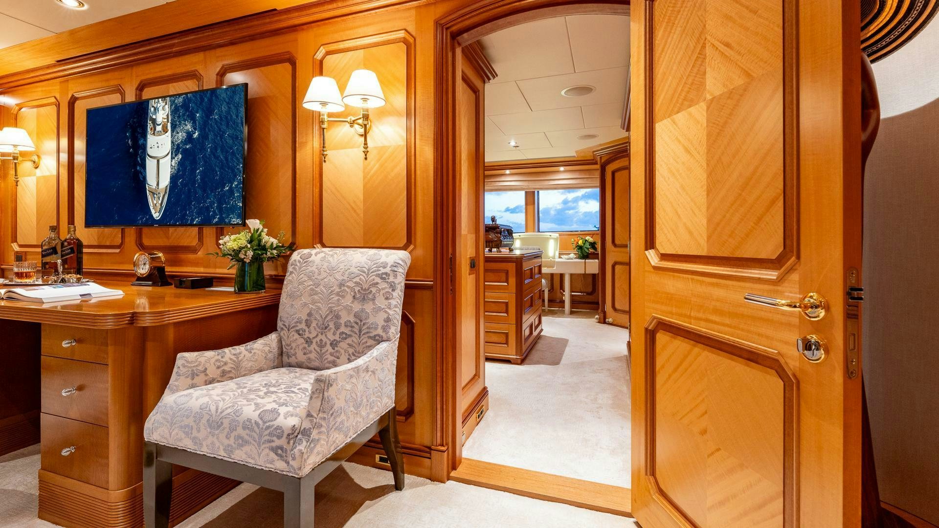 a chair in a room aboard AMANTI Yacht for Sale