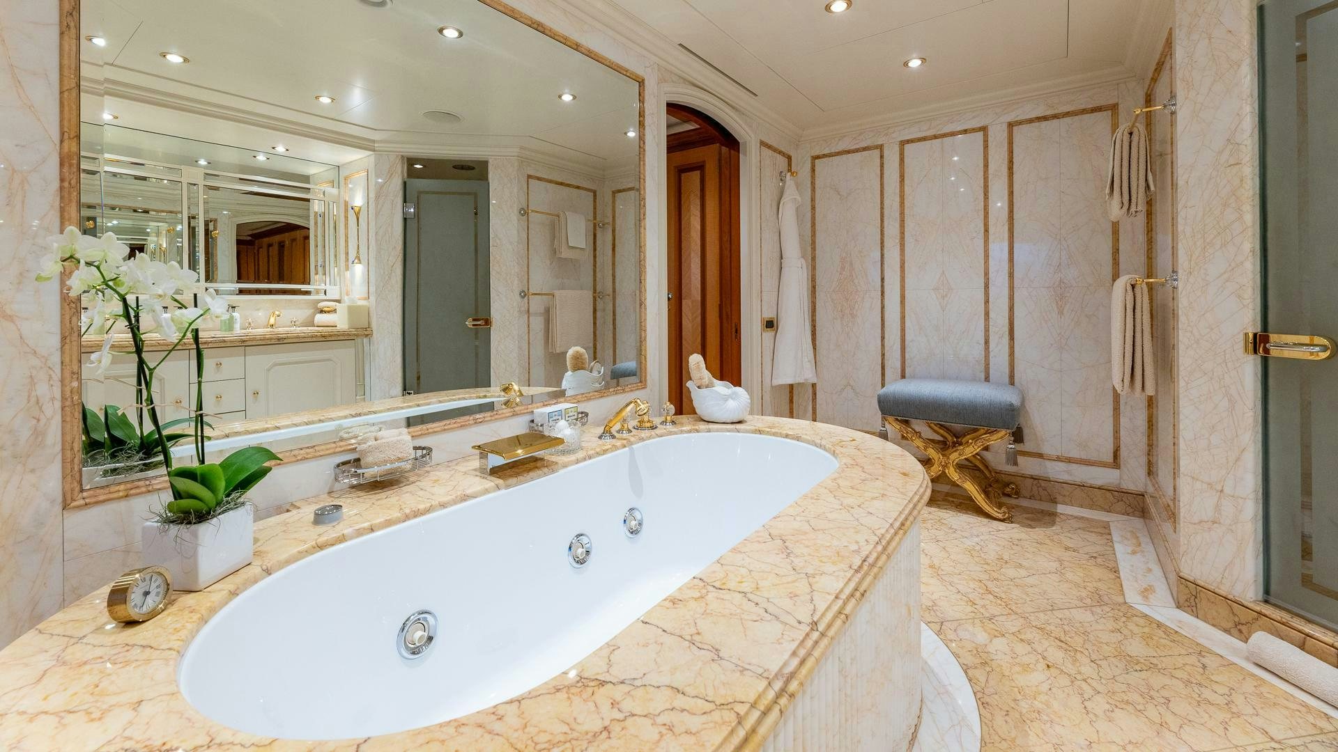 a large bathroom with a large bathtub aboard AMANTI Yacht for Sale