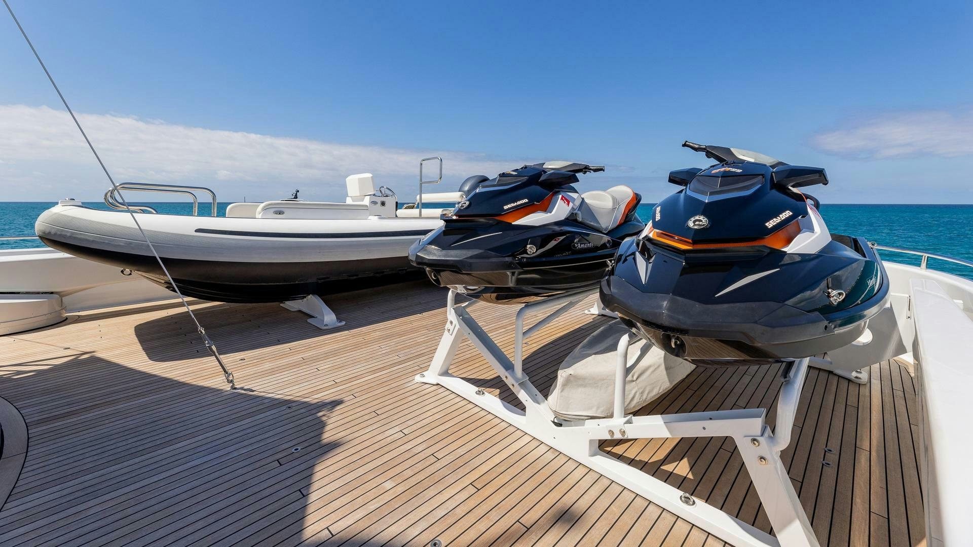 boats on a dock aboard AMANTI Yacht for Sale