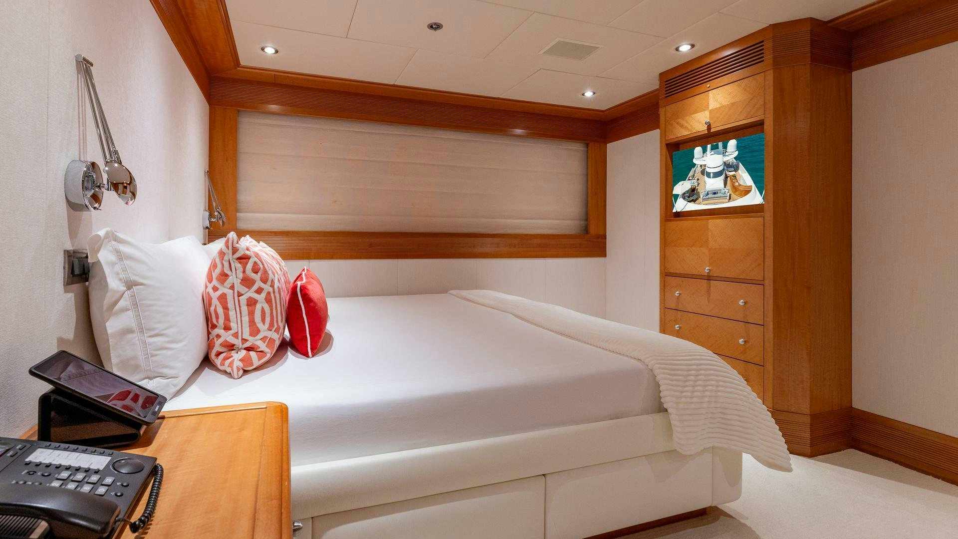 a bed in a room aboard AMANTI Yacht for Sale