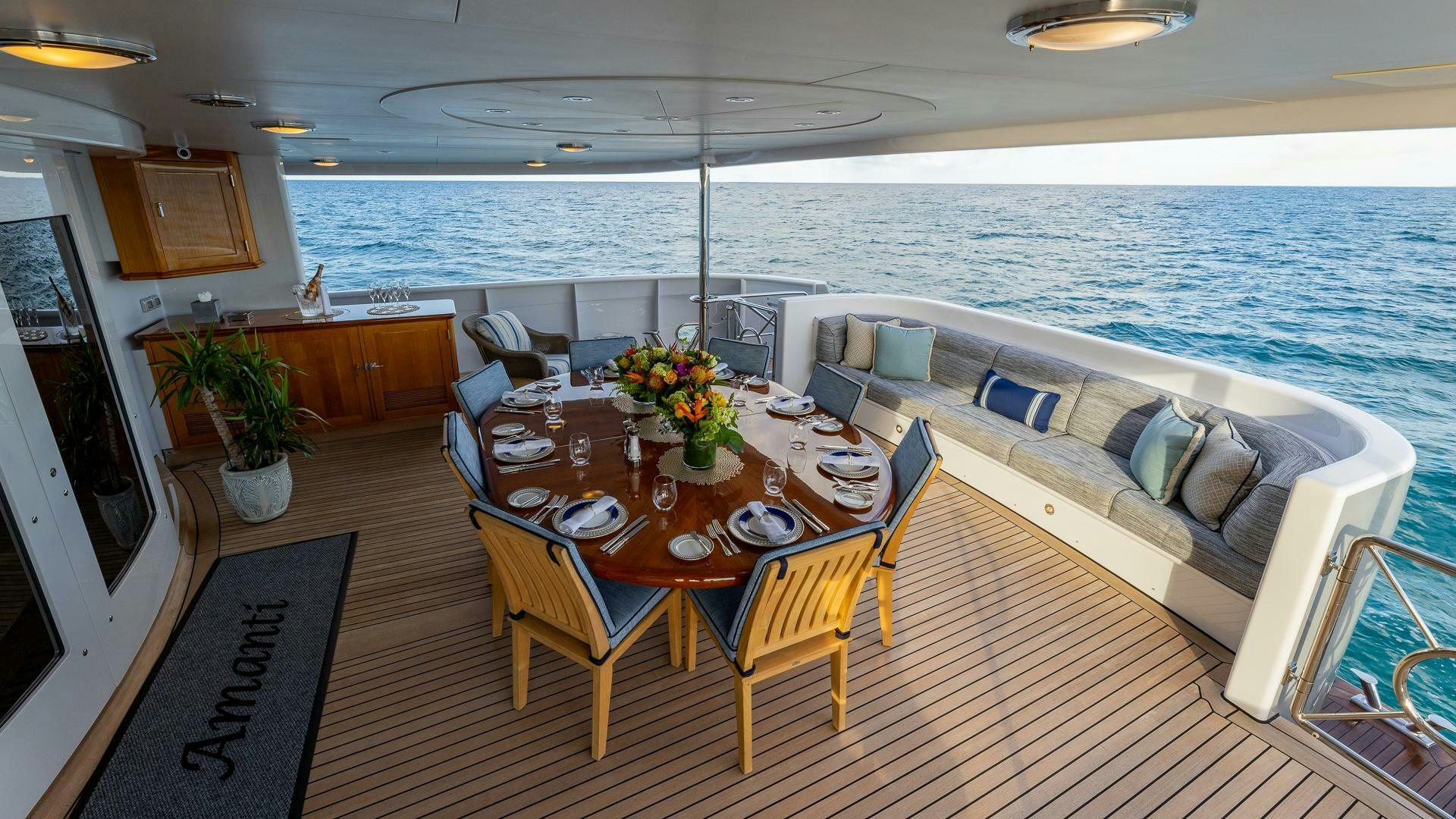 a dining table on a boat aboard AMANTI Yacht for Sale