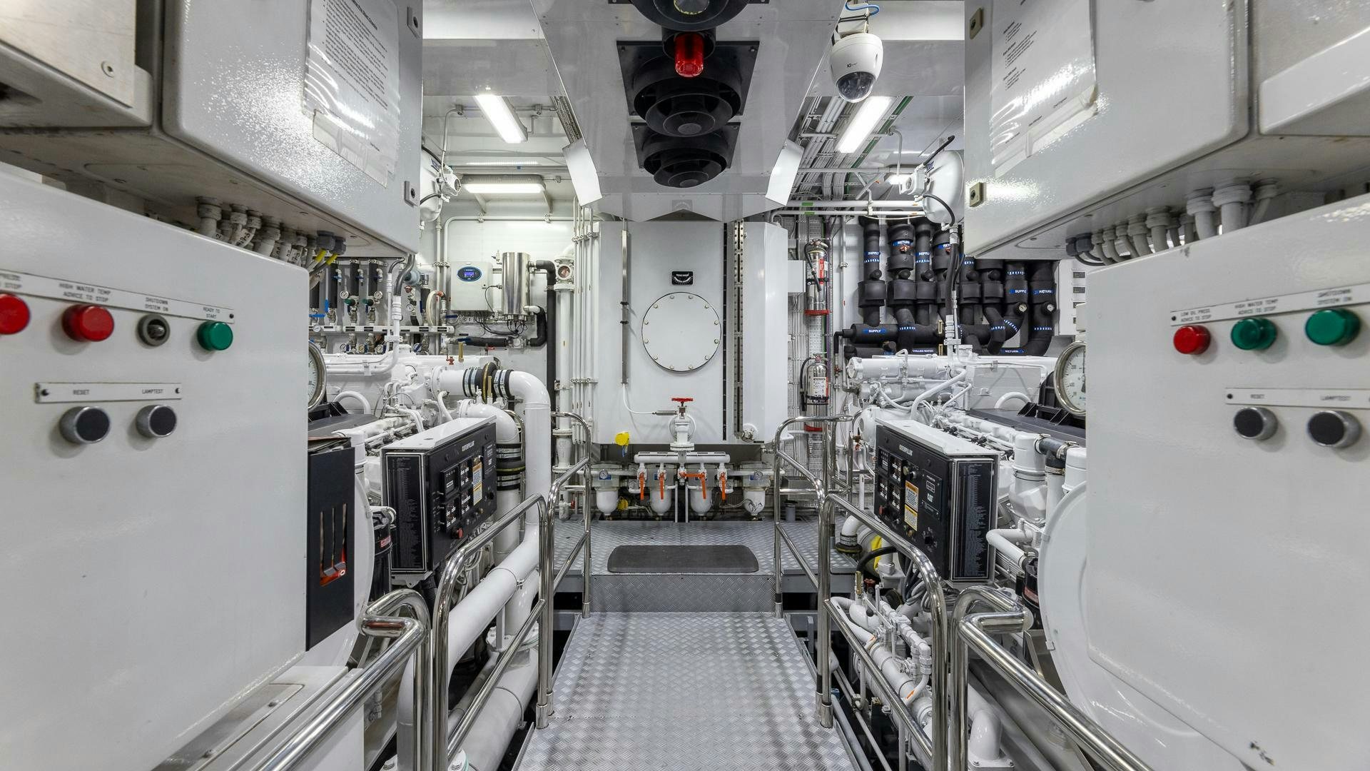 a room with several white machines aboard AMANTI Yacht for Sale