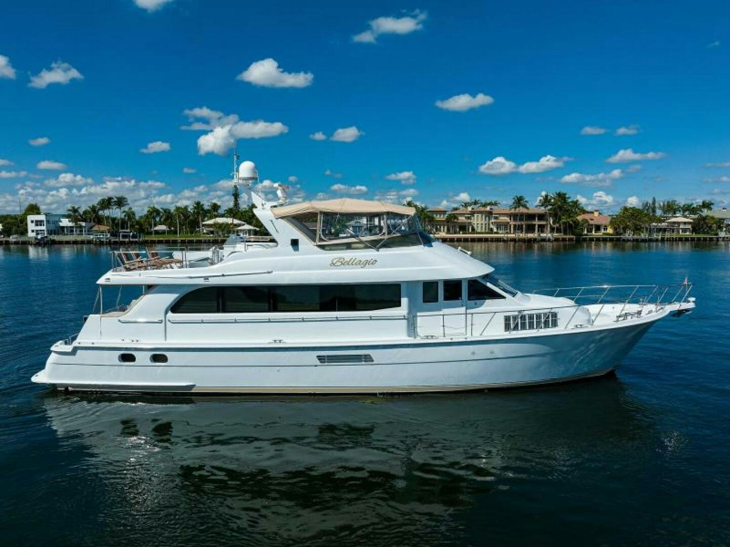 a white yacht in the water aboard BELLAGIO Yacht for Sale