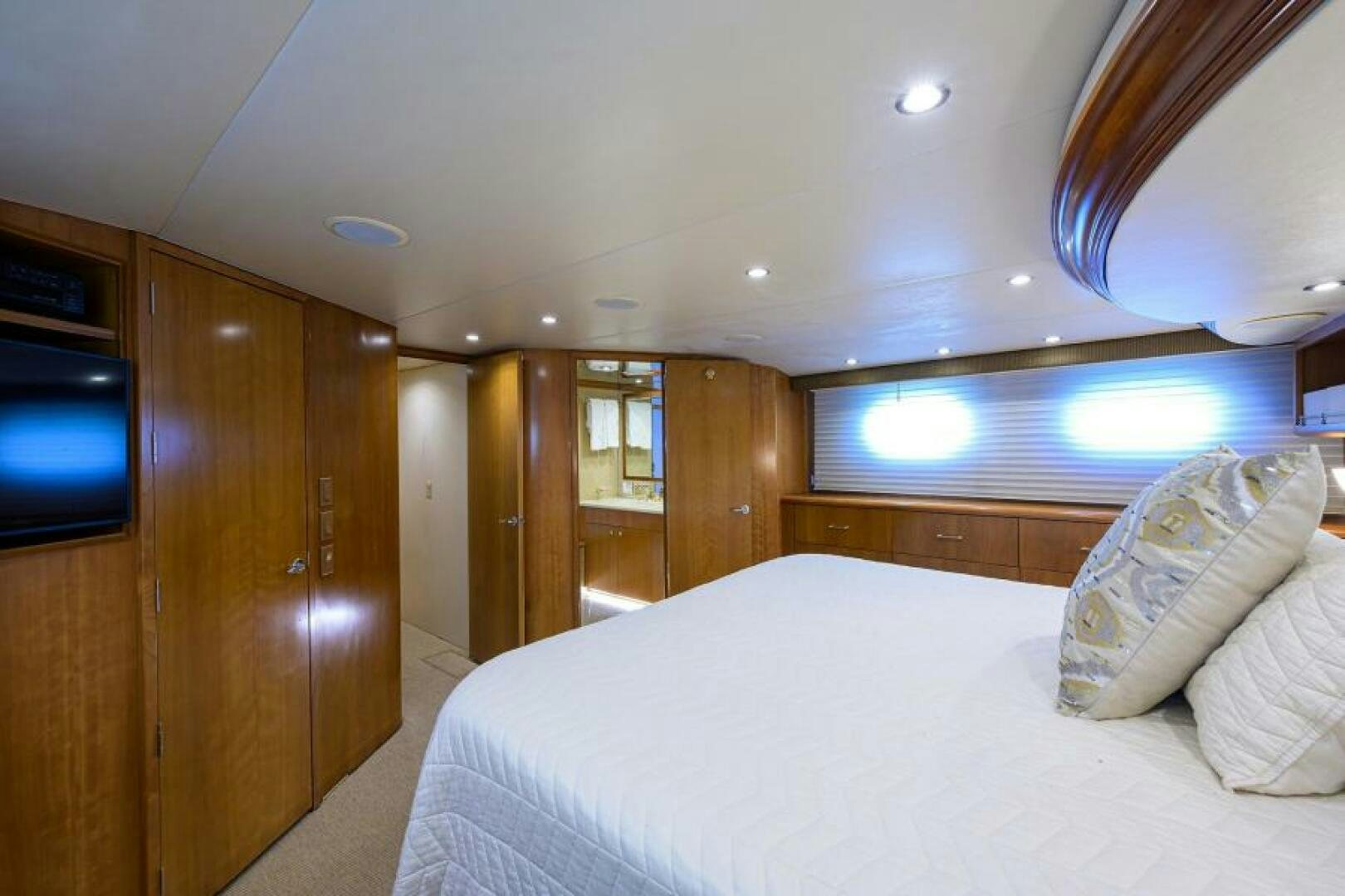 a bed in a room aboard BELLAGIO Yacht for Sale
