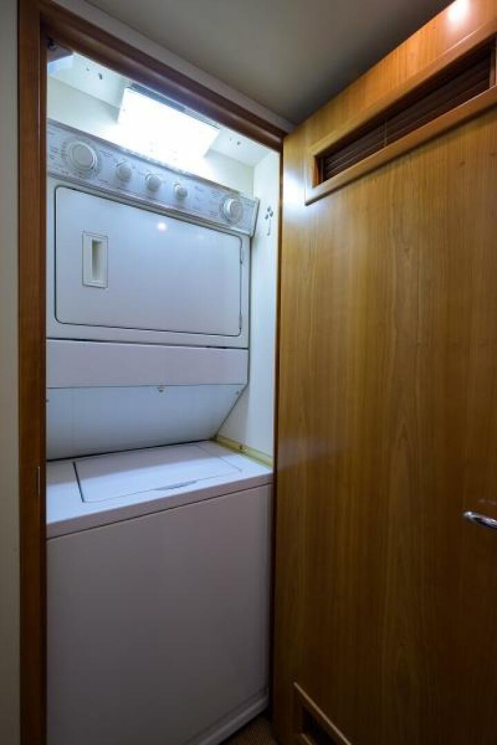 a white machine in a room aboard BELLAGIO Yacht for Sale