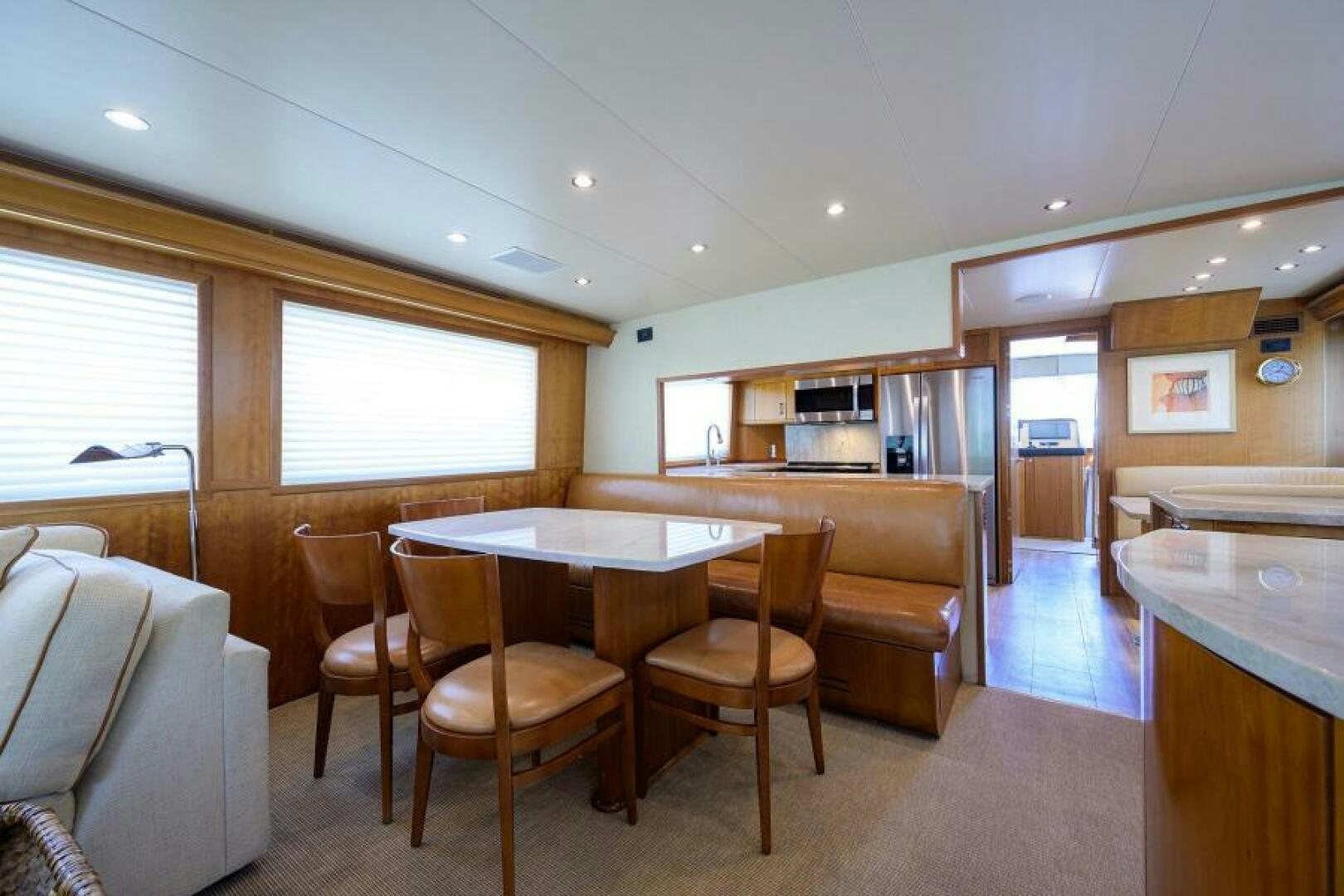 a kitchen and dining area aboard BELLAGIO Yacht for Sale