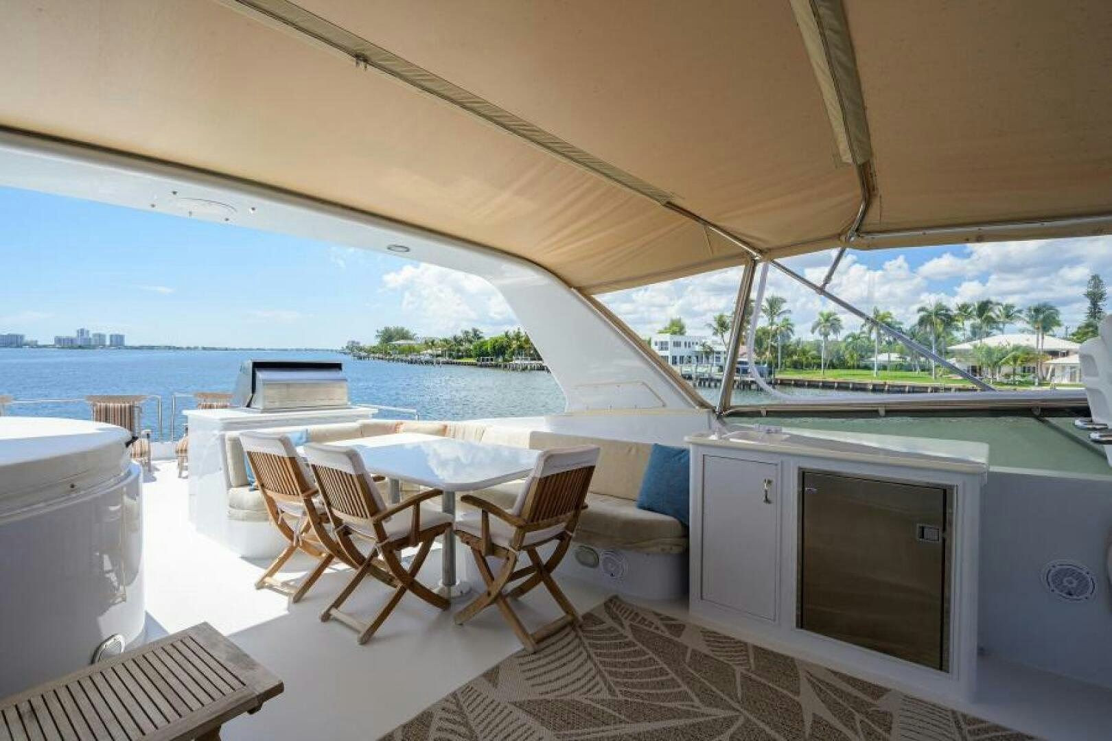 a room with a table and chairs aboard BELLAGIO Yacht for Sale