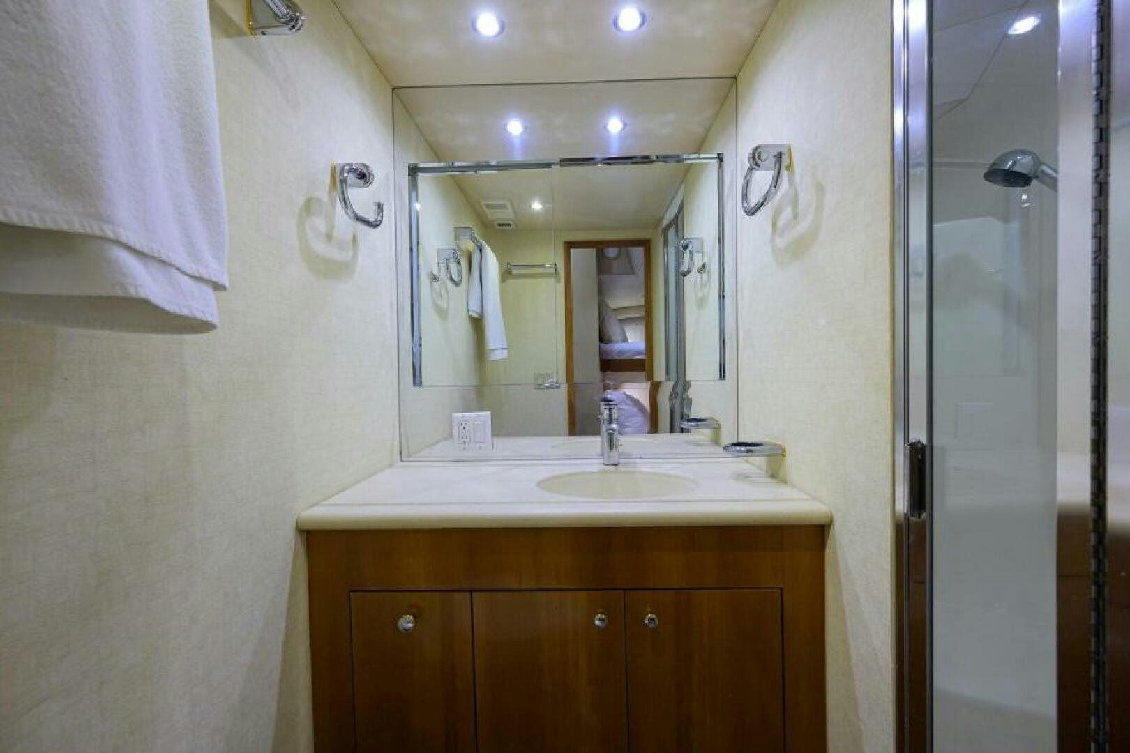 a bathroom with a sink and a shower aboard BELLAGIO Yacht for Sale