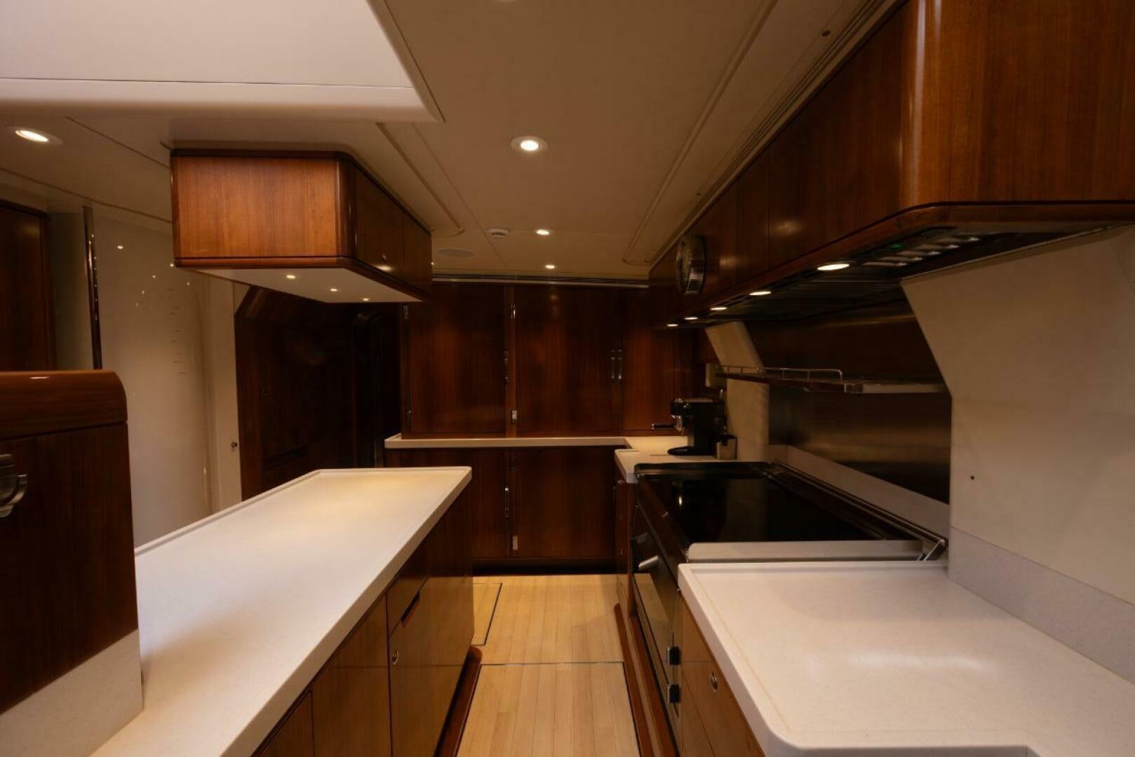 a kitchen with a large island aboard ANTARES Yacht for Sale