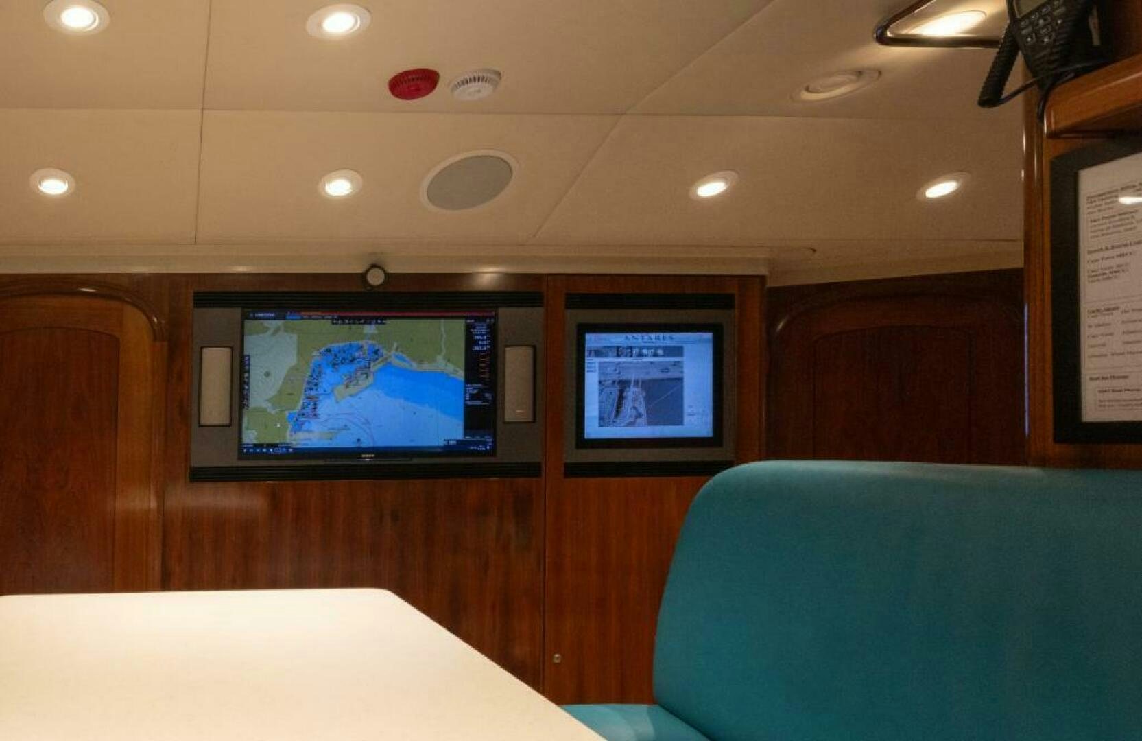 a room with a tv and a couch aboard ANTARES Yacht for Sale