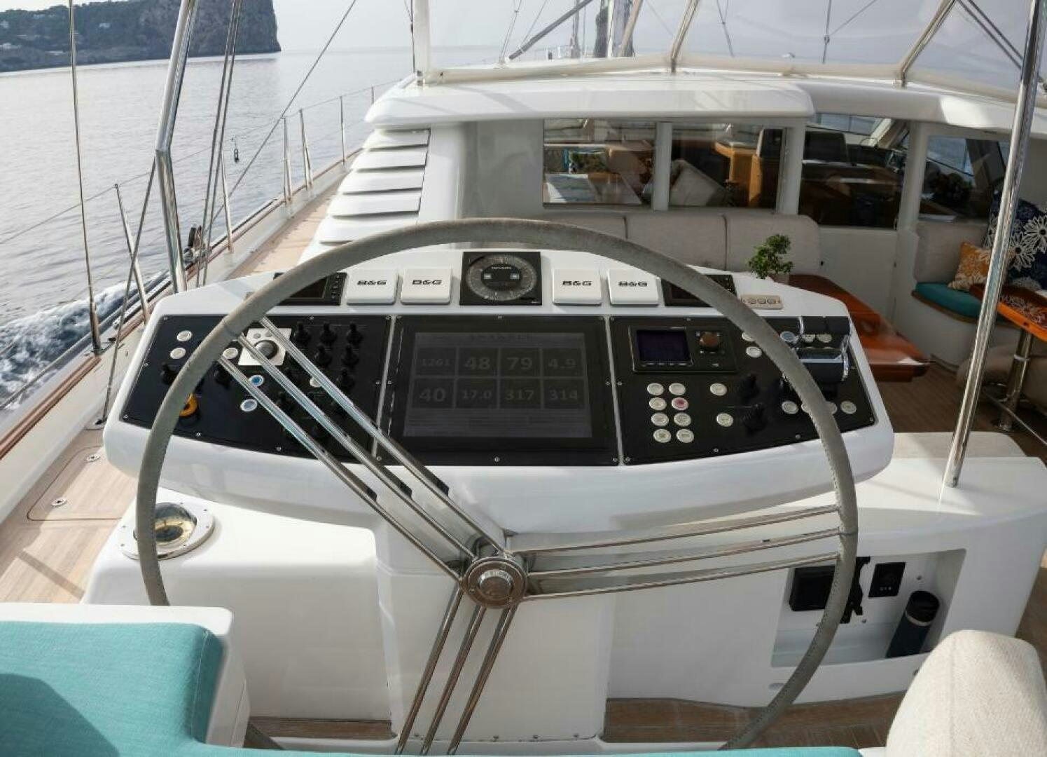 a boat with a steering wheel aboard ANTARES Yacht for Sale