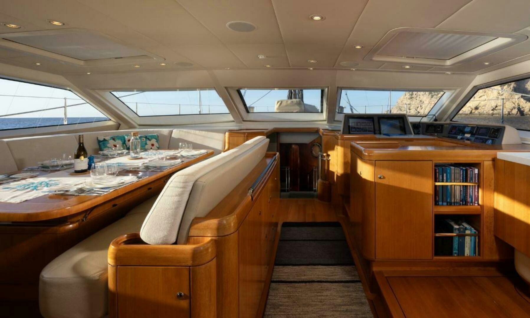a room with a desk and a chair and a bookcase aboard ANTARES Yacht for Sale