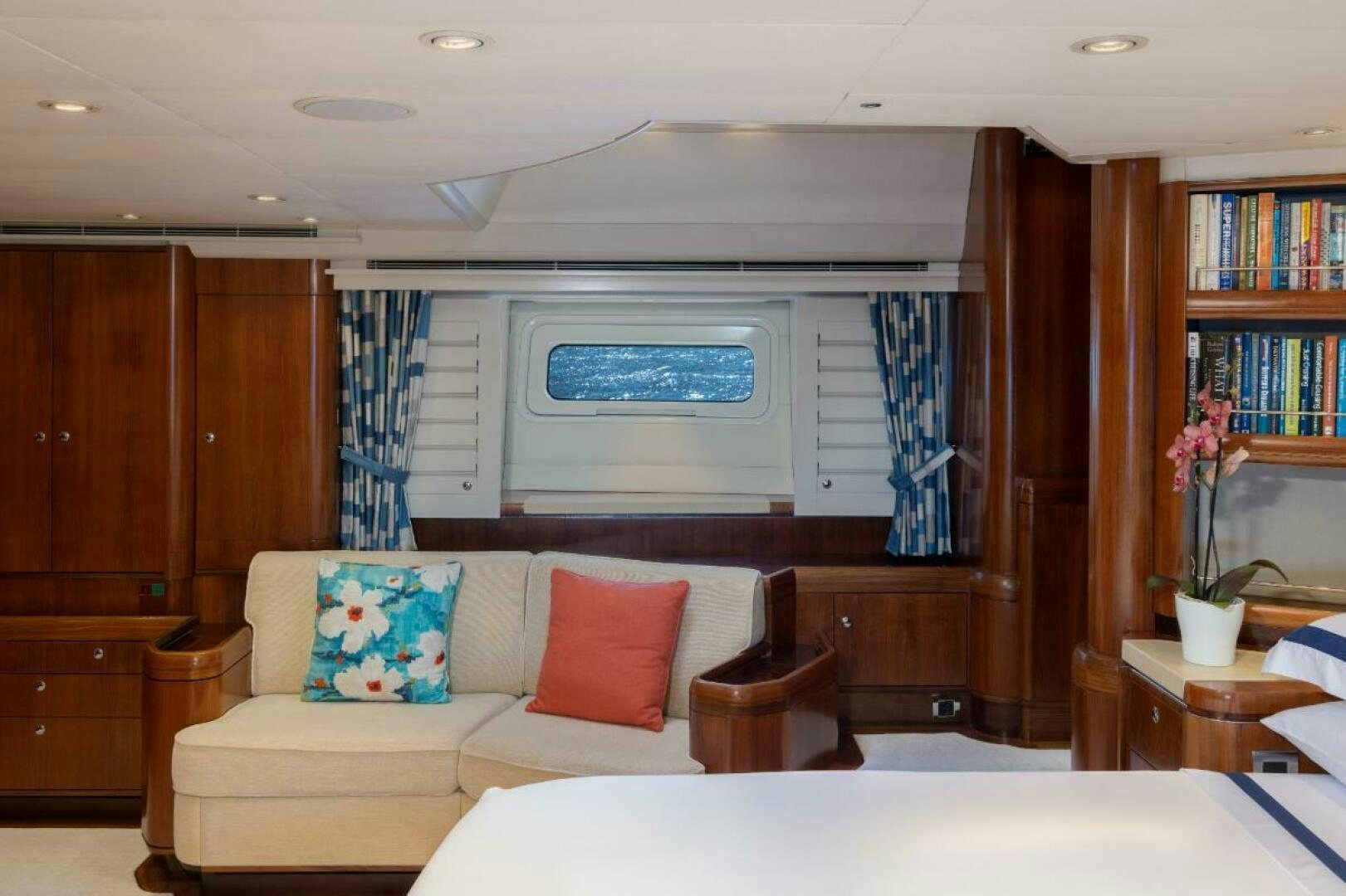 a living room with a couch and a television aboard ANTARES Yacht for Sale
