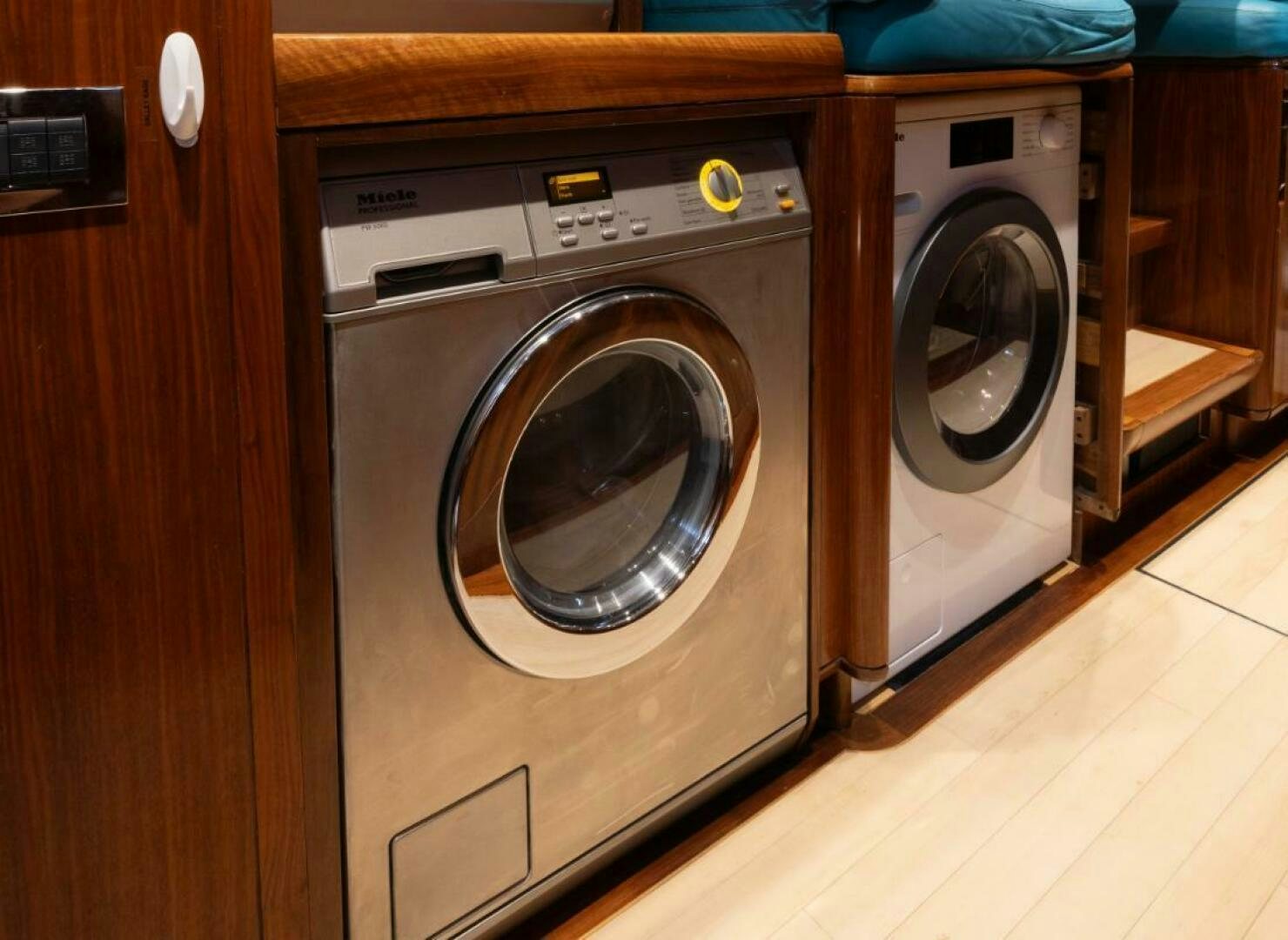 a washing machine in a room aboard ANTARES Yacht for Sale
