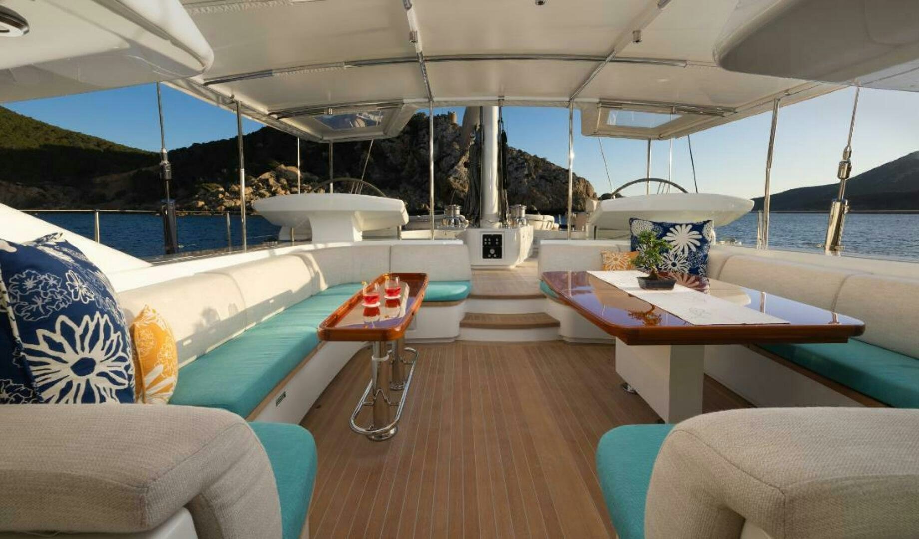 a boat with a table and chairs aboard ANTARES Yacht for Sale