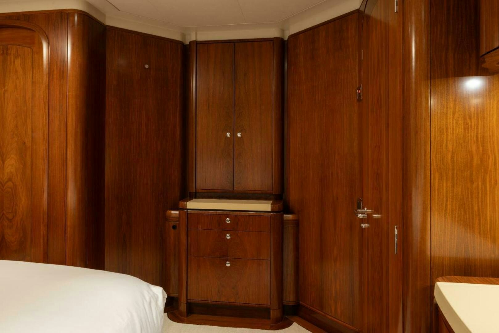 a room with wooden cabinets aboard ANTARES Yacht for Sale