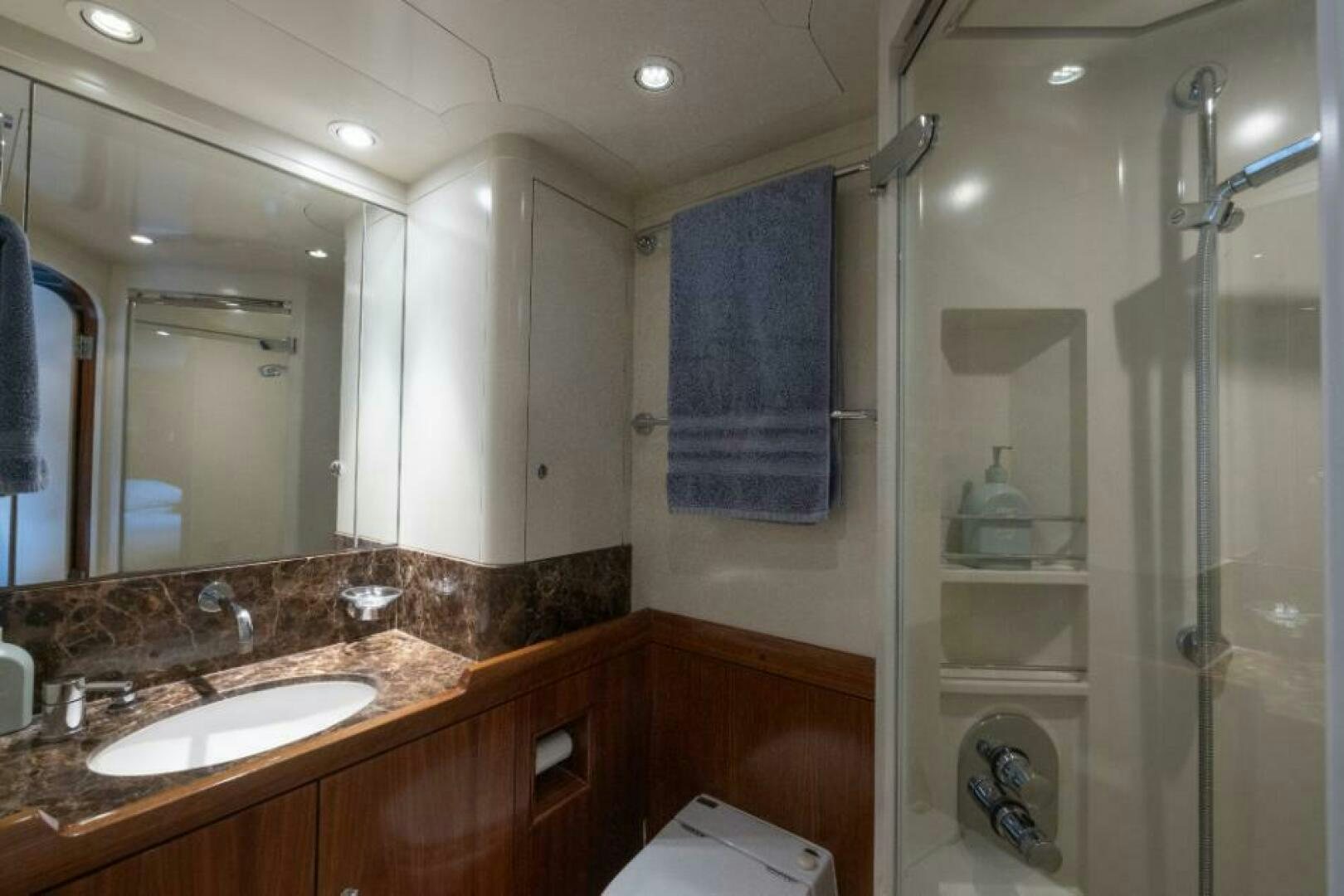 a bathroom with a sink and a mirror aboard ANTARES Yacht for Sale