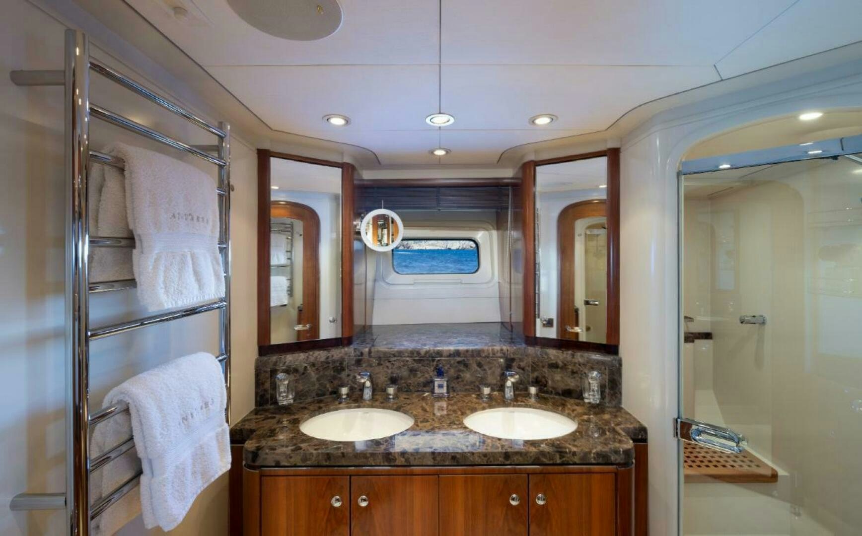 a bathroom with a sink and mirror aboard ANTARES Yacht for Sale