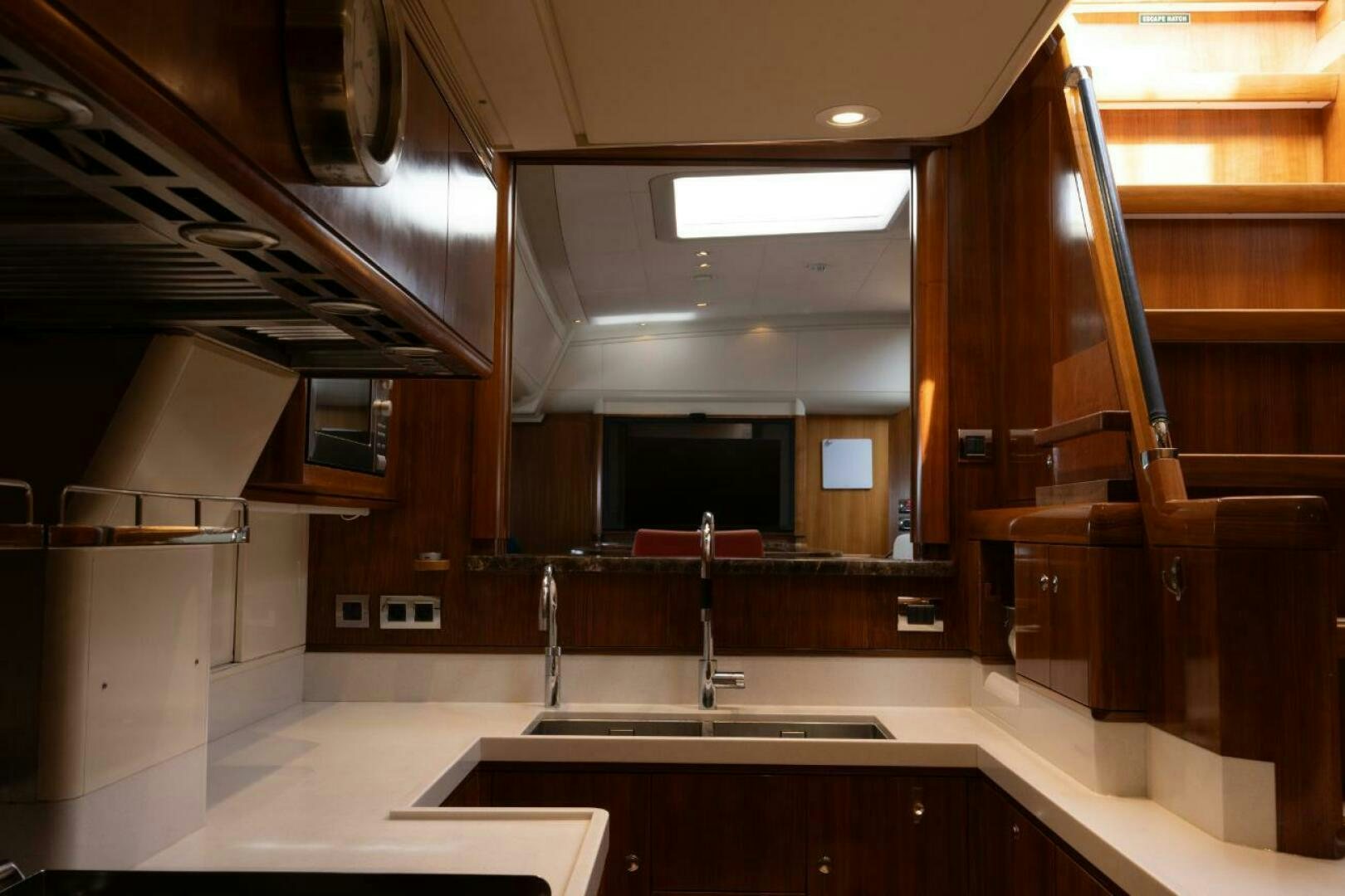 a kitchen with a large island aboard ANTARES Yacht for Sale