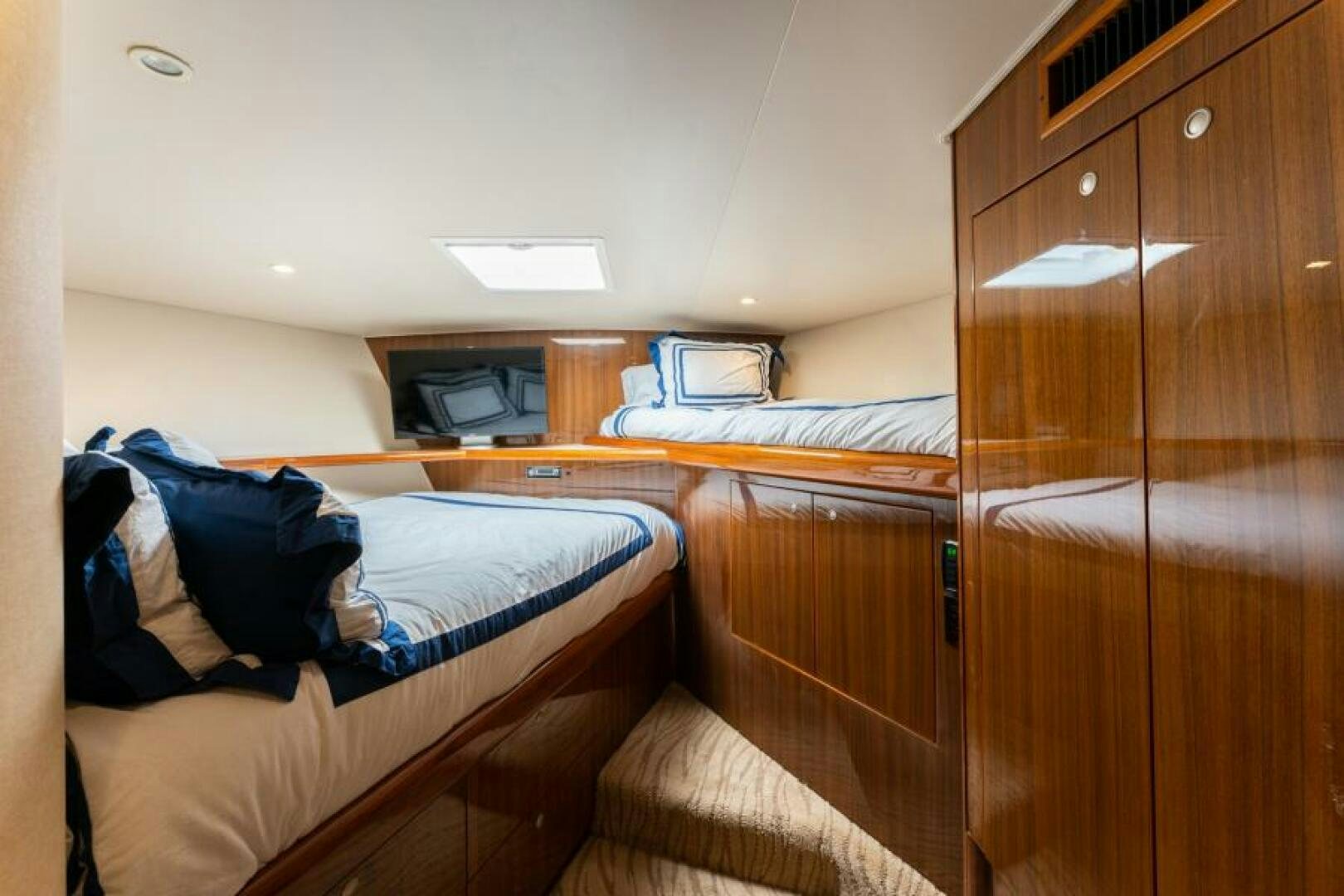 a room with bunk beds aboard SALT STRUK Yacht for Sale