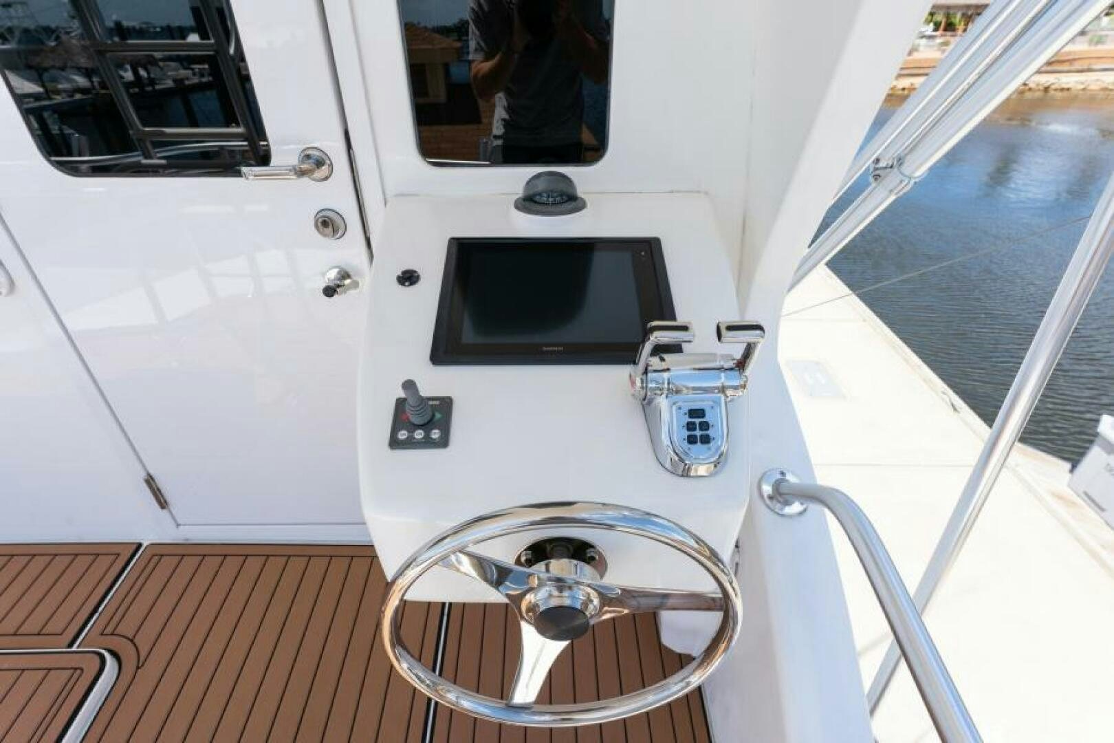 a white machine on a boat aboard SALT STRUK Yacht for Sale