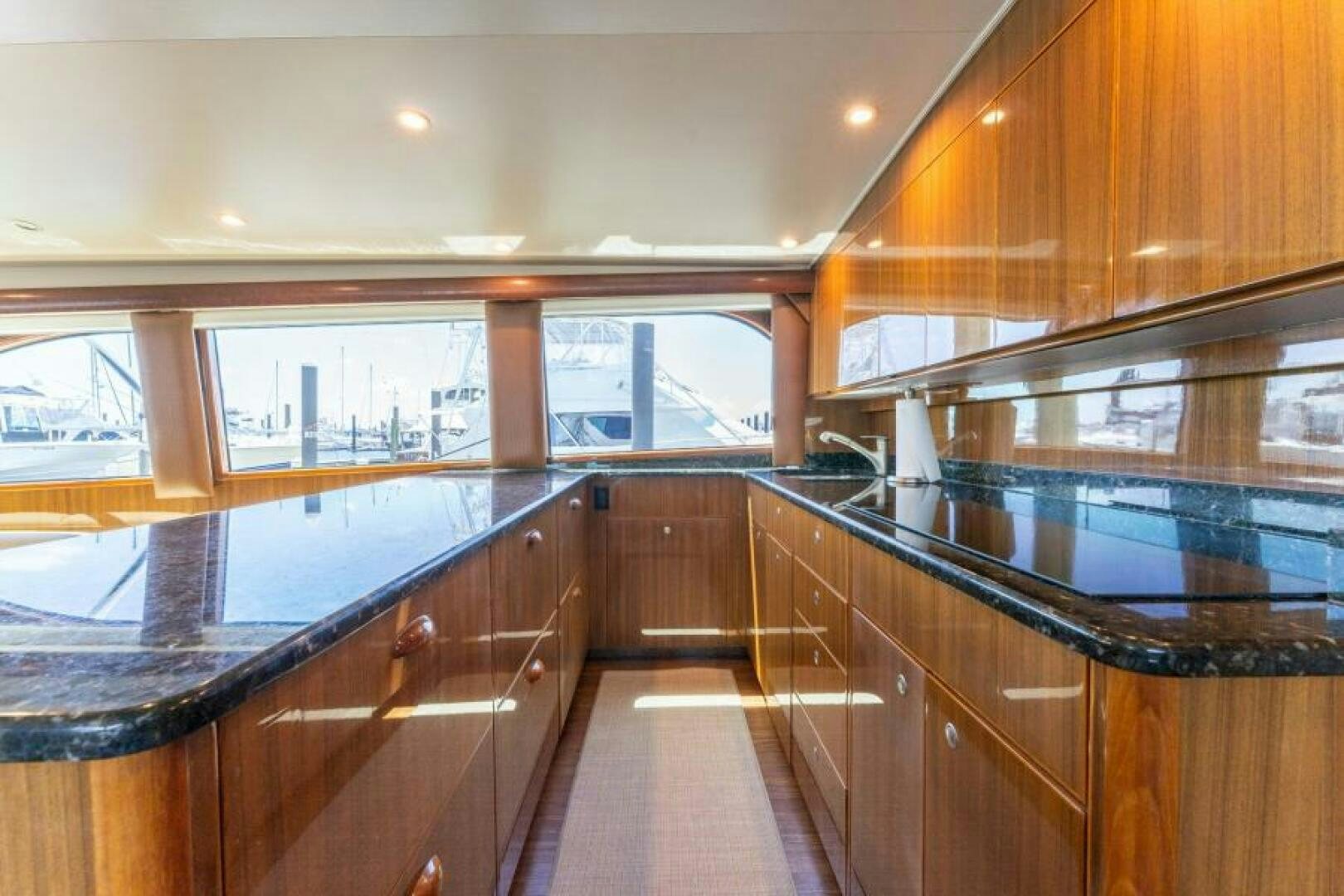 a wooden room with wood cabinets aboard SALT STRUK Yacht for Sale