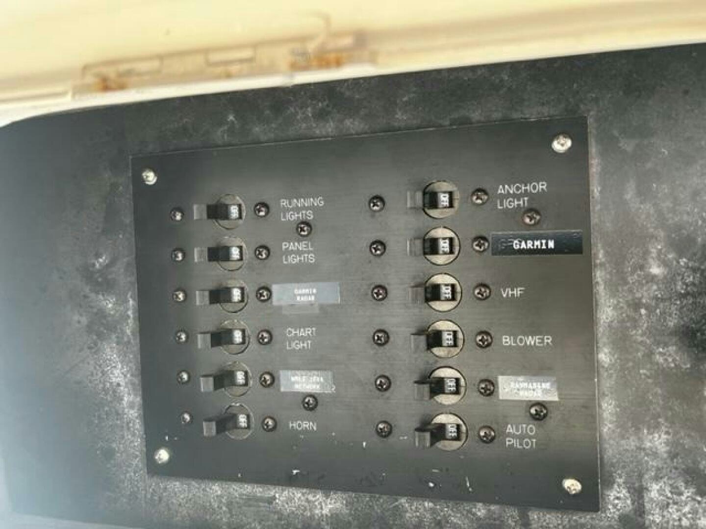 a black calculator with a screen aboard GREAT WHITE Yacht for Sale