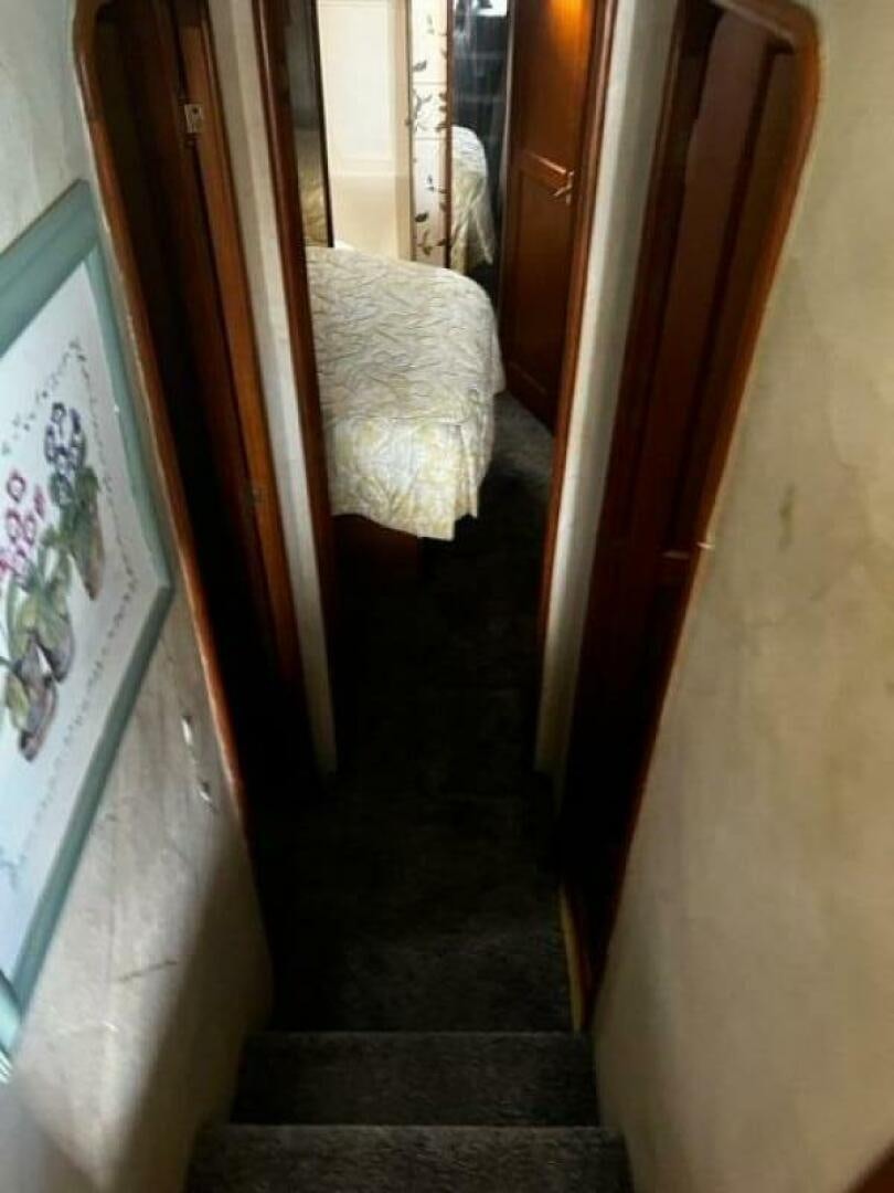 a hallway with a door aboard GREAT WHITE Yacht for Sale