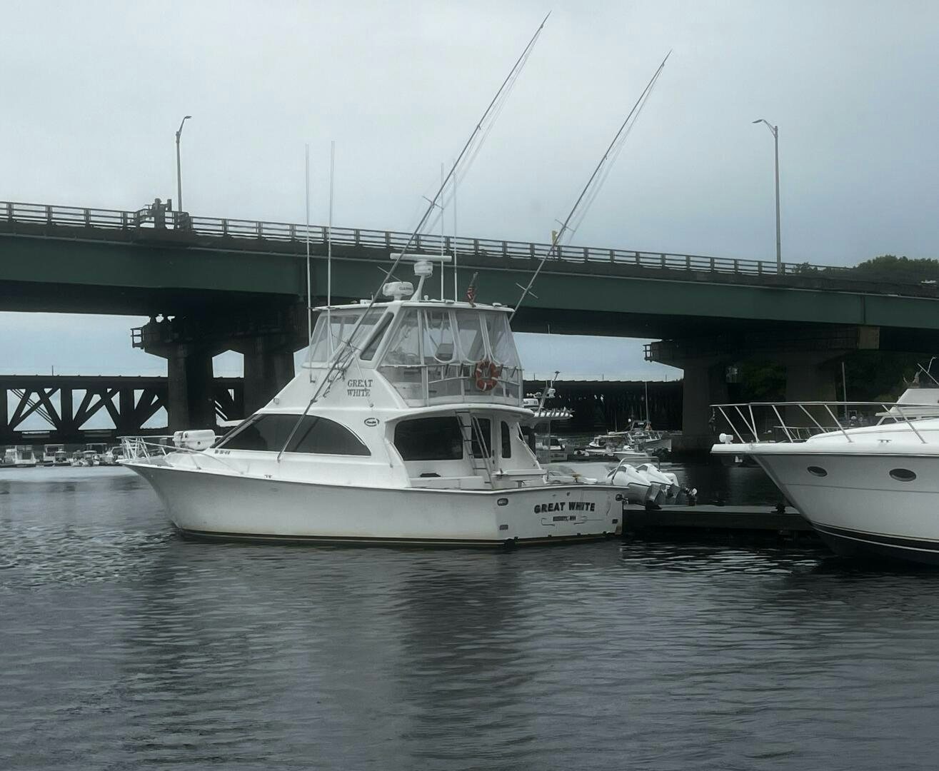 a couple of boats docked aboard GREAT WHITE Yacht for Sale