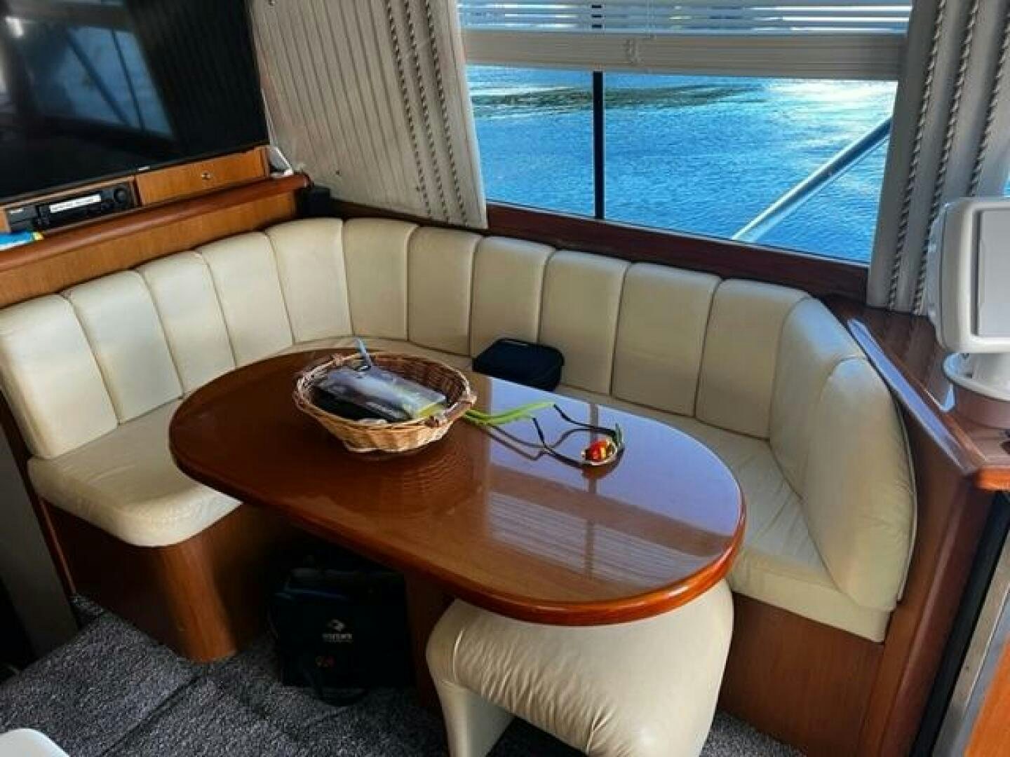 a table with a bowl on it aboard GREAT WHITE Yacht for Sale