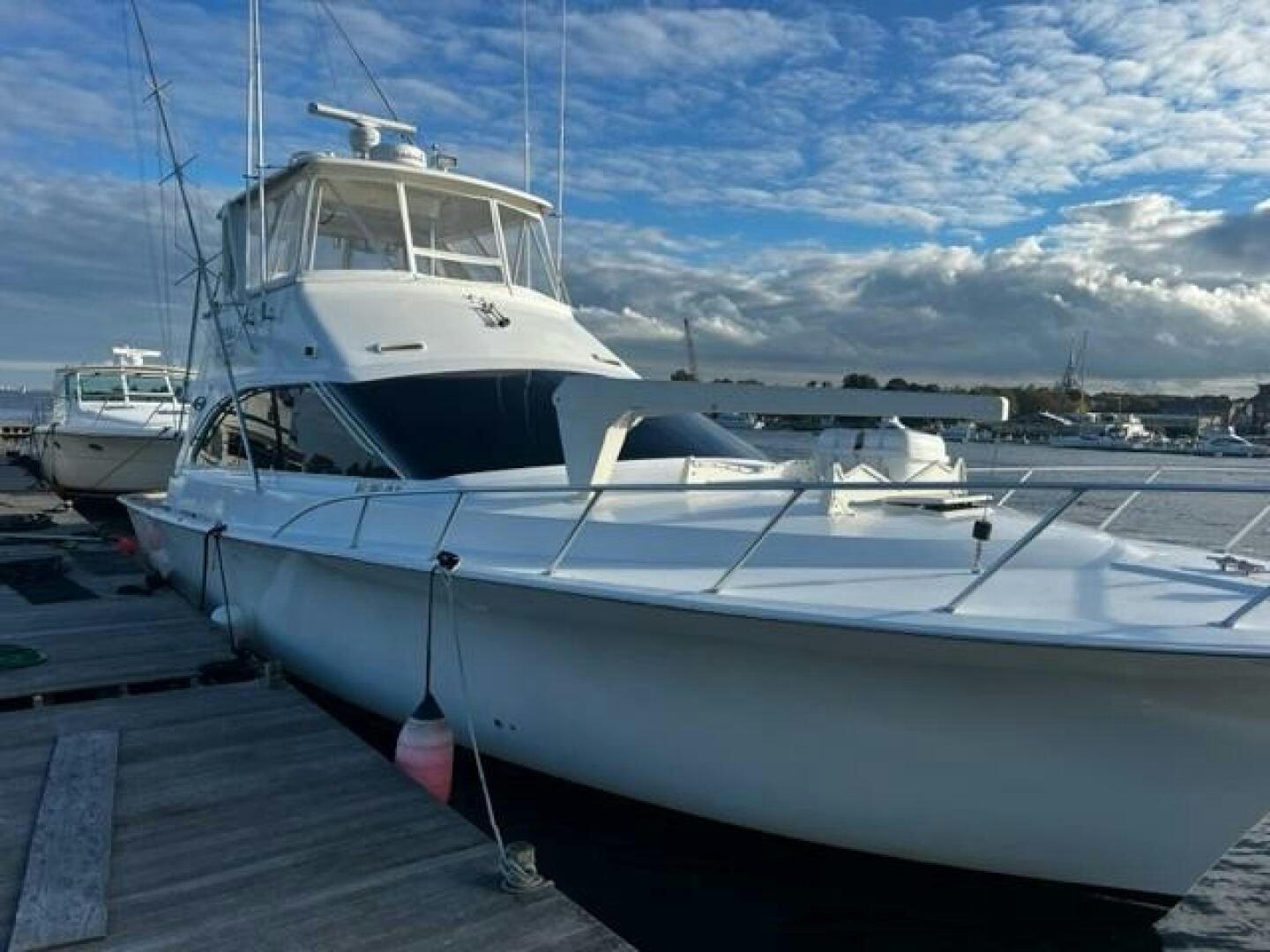 a boat docked at a pier aboard GREAT WHITE Yacht for Sale