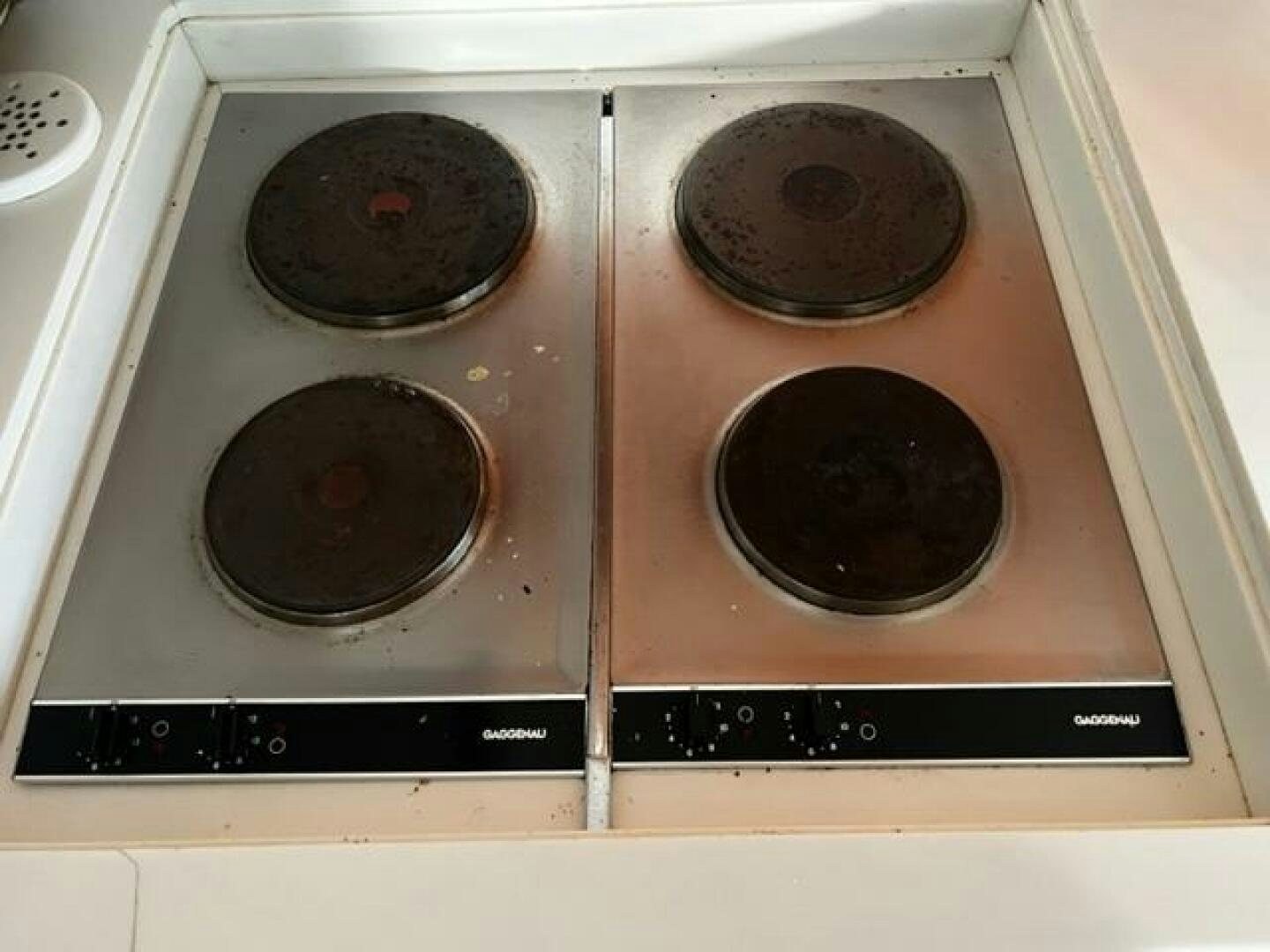 a group of pans on a stove aboard GREAT WHITE Yacht for Sale