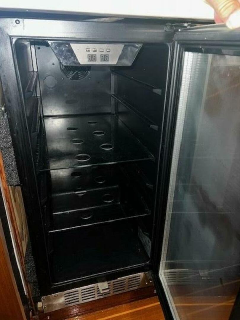 a black stove with a silver door aboard GREAT WHITE Yacht for Sale