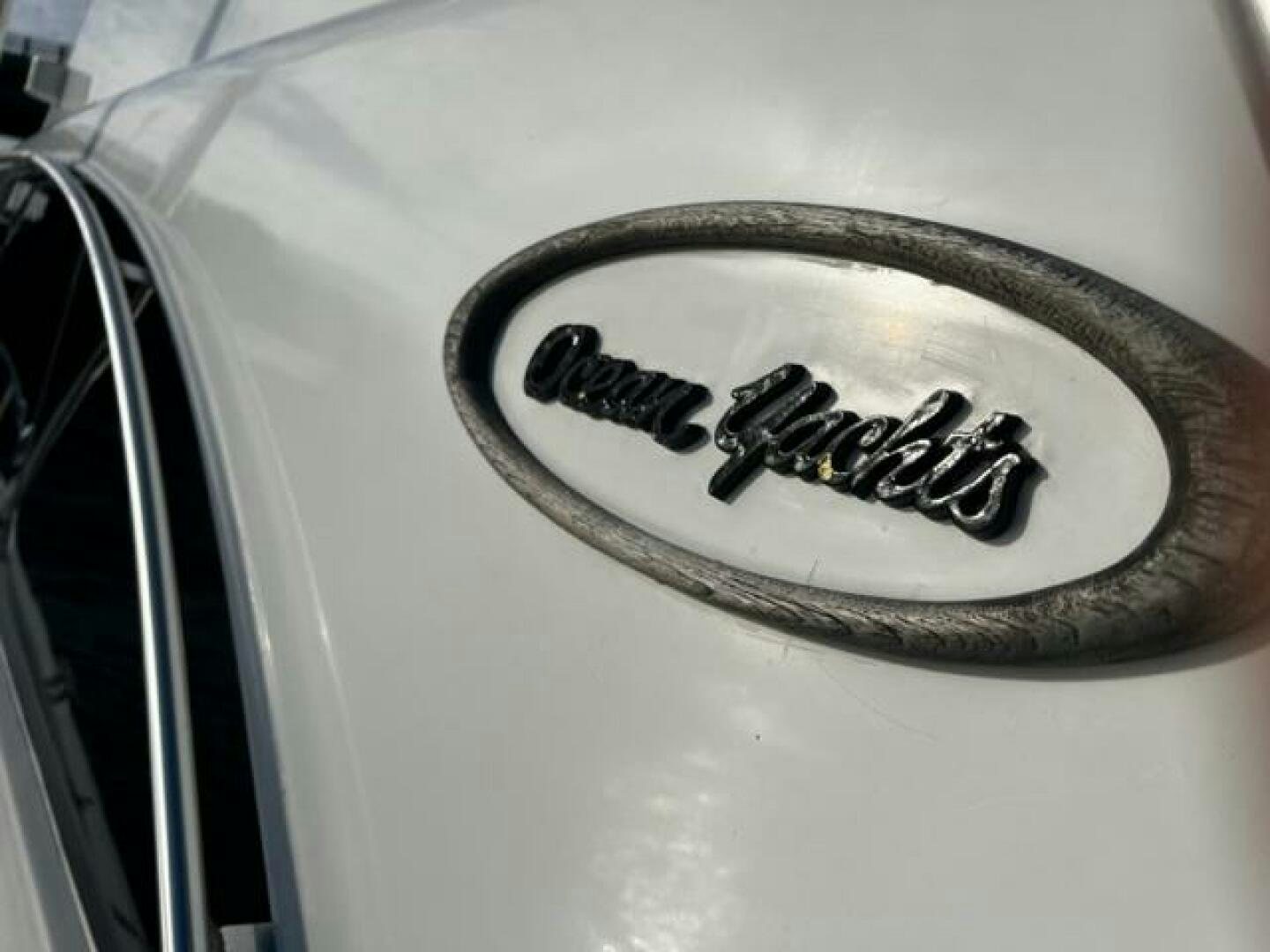 a circular object with text on it aboard GREAT WHITE Yacht for Sale