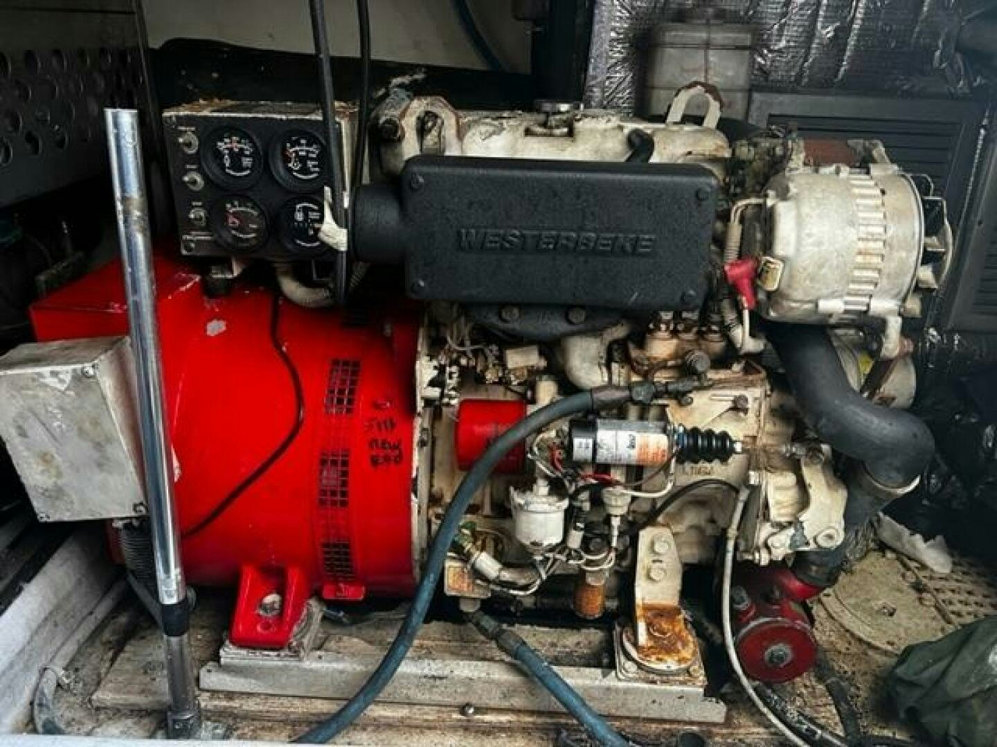 a machine with a red and black pipe aboard GREAT WHITE Yacht for Sale
