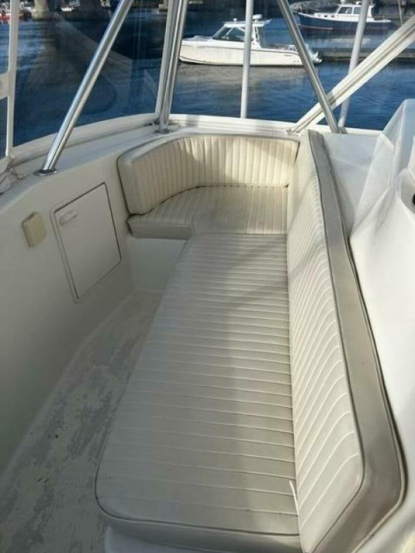 a white boat with a wooden deck aboard GREAT WHITE Yacht for Sale