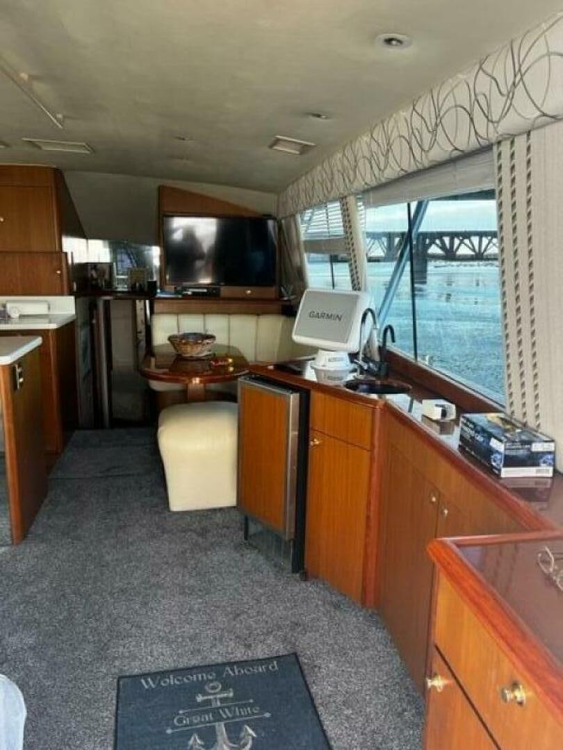 a room with a desk and a tv aboard GREAT WHITE Yacht for Sale