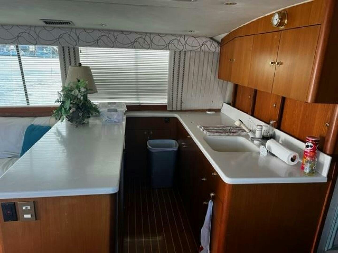 a kitchen with a sink and cabinets aboard GREAT WHITE Yacht for Sale