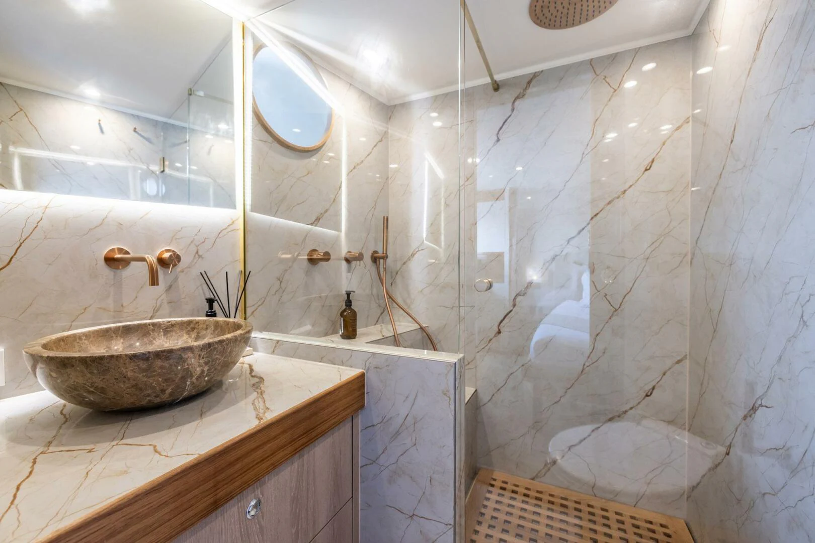 a bathroom with a sink and a bathtub aboard SISSI Yacht for Sale