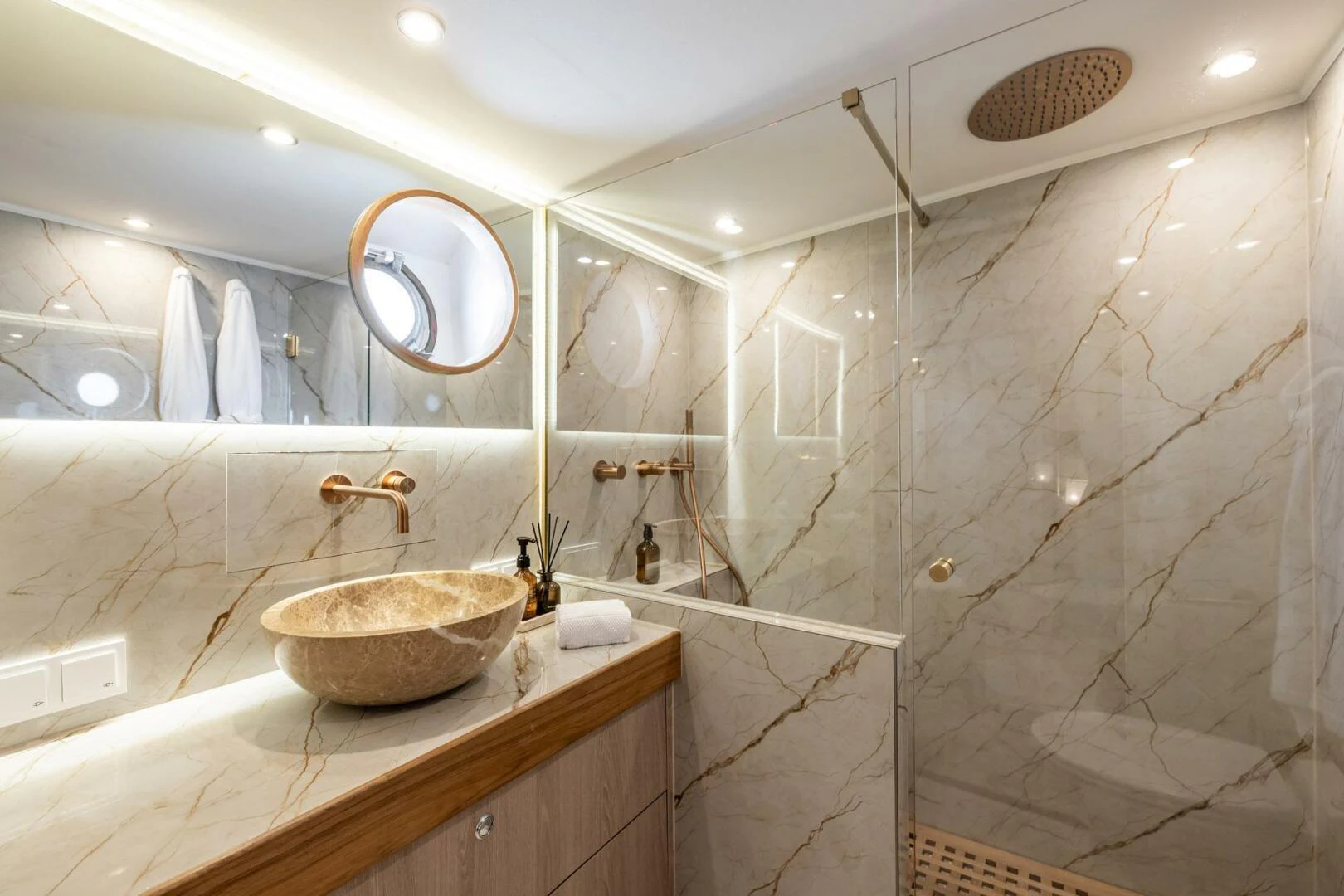 a bathroom with a sink and a bathtub aboard SISSI Yacht for Sale