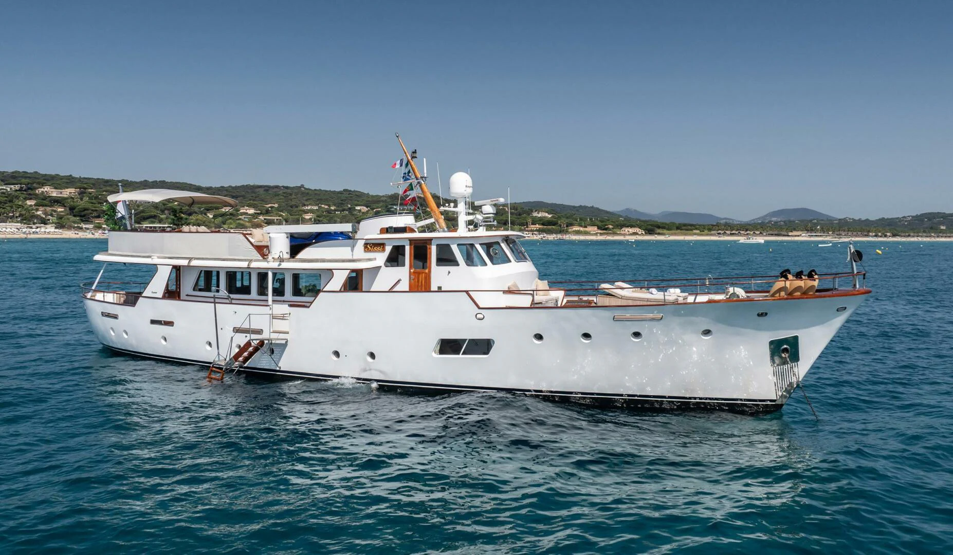 a couple of white boats in the water aboard SISSI Yacht for Sale