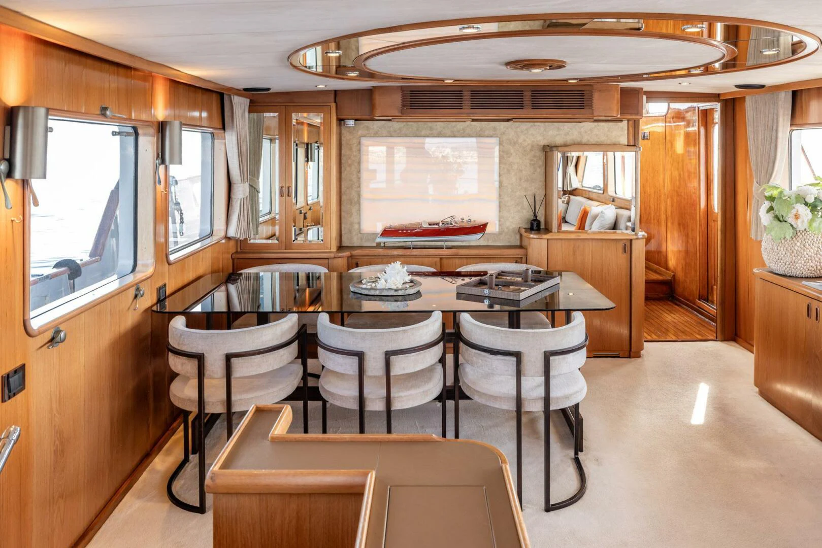 a dining room with a table and chairs aboard SISSI Yacht for Sale
