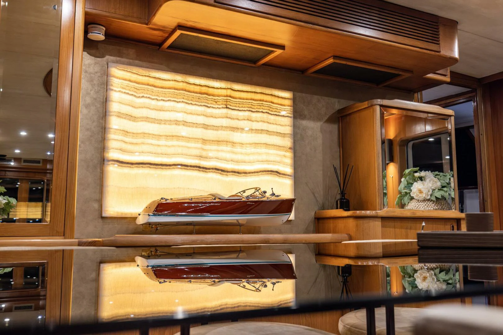 a room with a table and chairs aboard SISSI Yacht for Sale