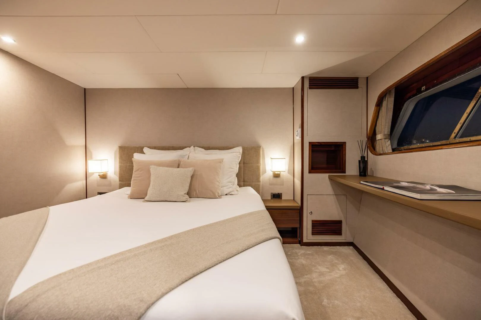 a hotel room with a bed and a desk aboard SISSI Yacht for Sale