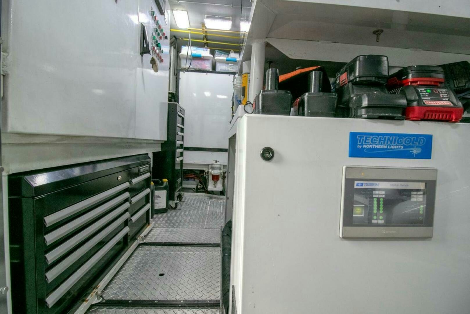 a room with a machine aboard CHAIRMAN  Yacht for Sale