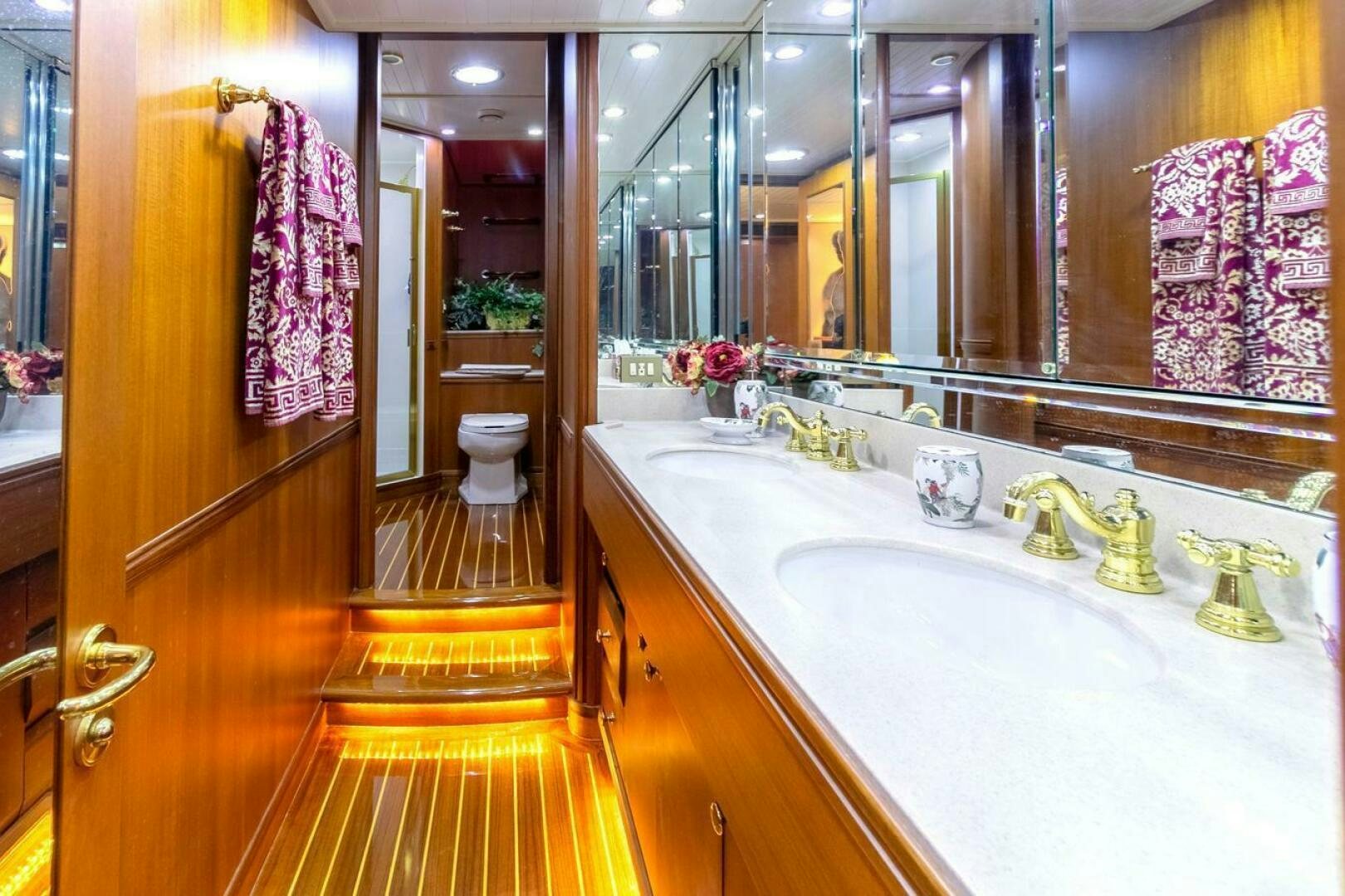 a bathroom with a large mirror aboard CHAIRMAN  Yacht for Sale