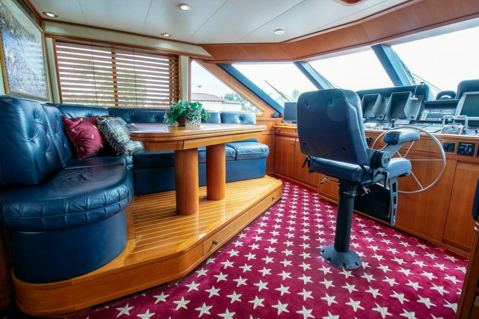 a black chair in a room aboard CHAIRMAN  Yacht for Sale