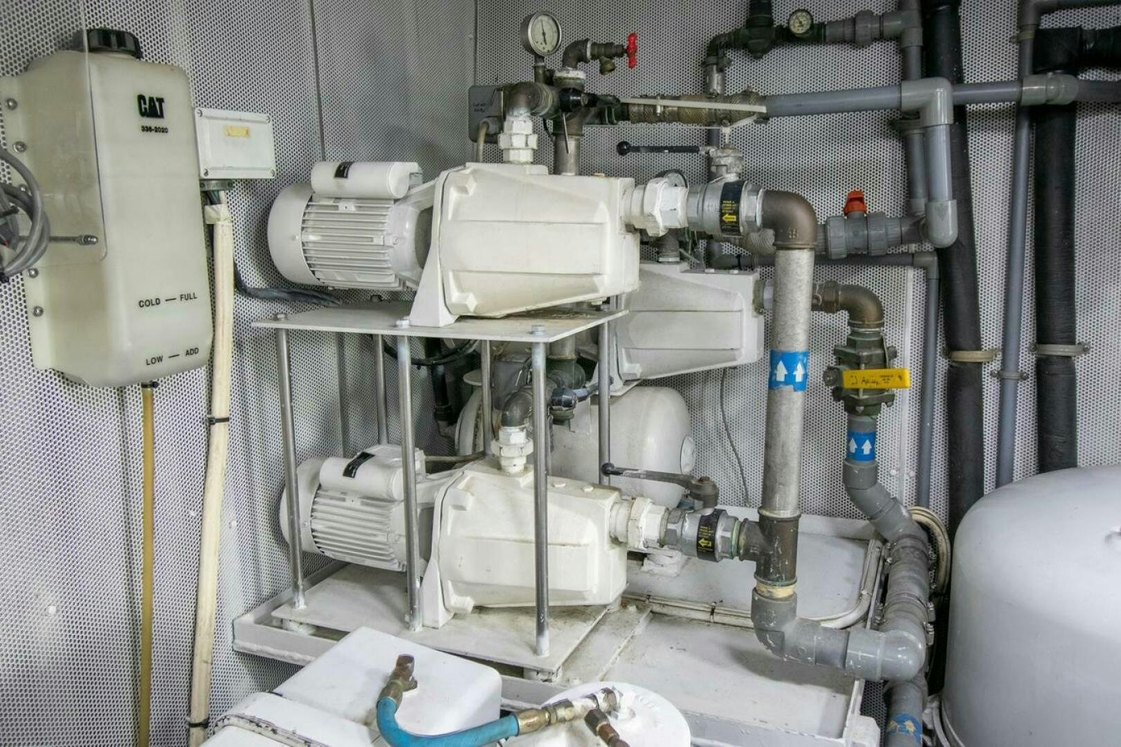 a machine with a large white cylinder aboard CHAIRMAN  Yacht for Sale