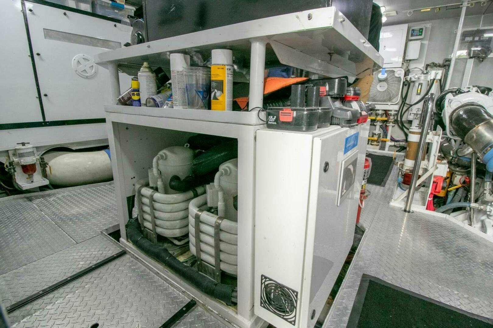 a white machine with a green substance inside aboard CHAIRMAN  Yacht for Sale