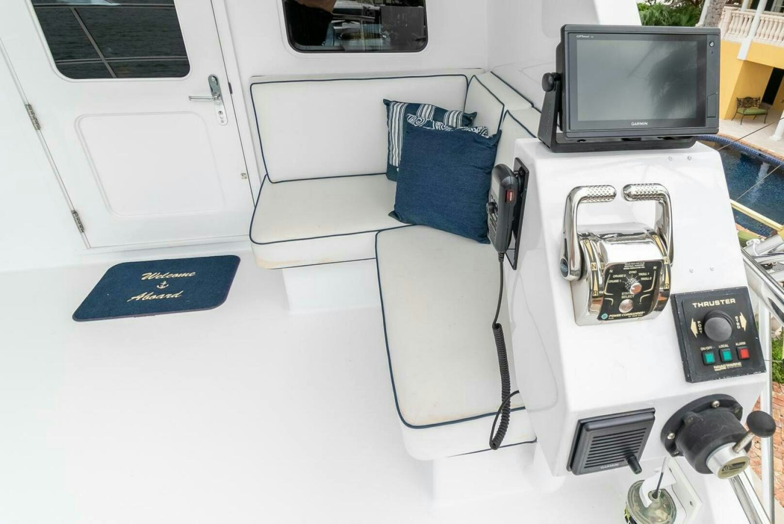a white car with a blue seat aboard CHAIRMAN  Yacht for Sale